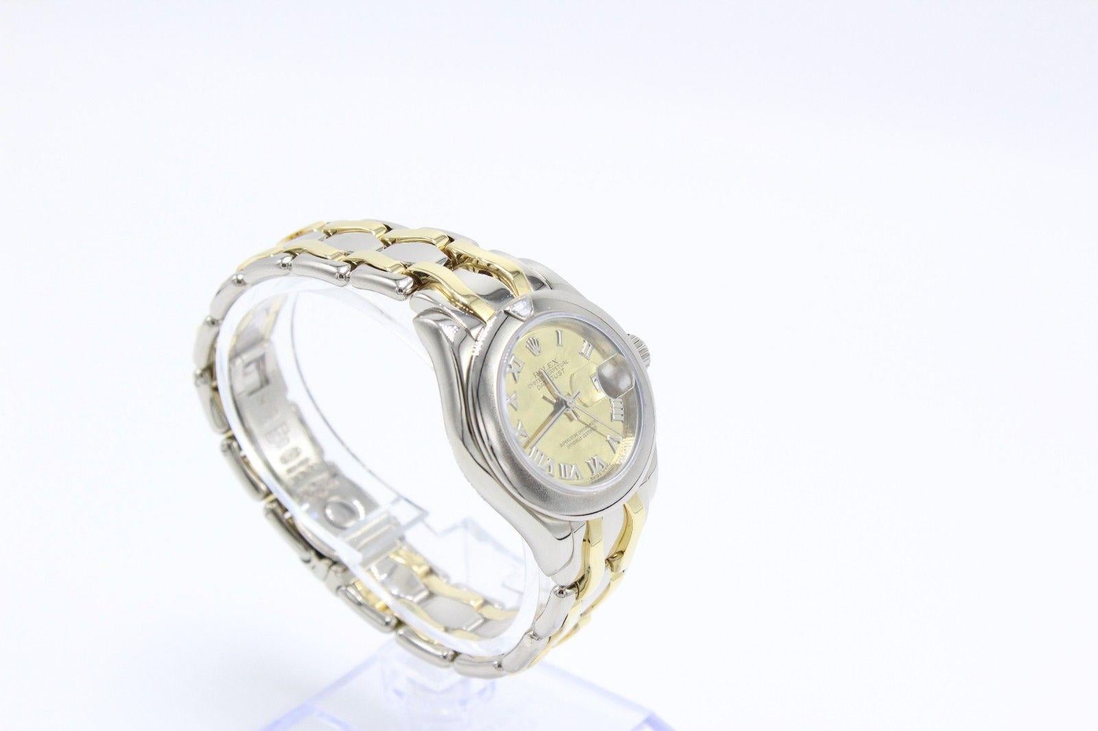 Style Number: 69329

Serial: W055***

Model: Pearlmaster

Case: 29mm

Band: 18K Yellow & White Gold

Bezel: 18K White Gold with Diamond at the 12 O'Clock 

Dial: Champagne

Face: Sapphire Crystal 

Case Size: 29mm

Includes: 

-Elegant Watch