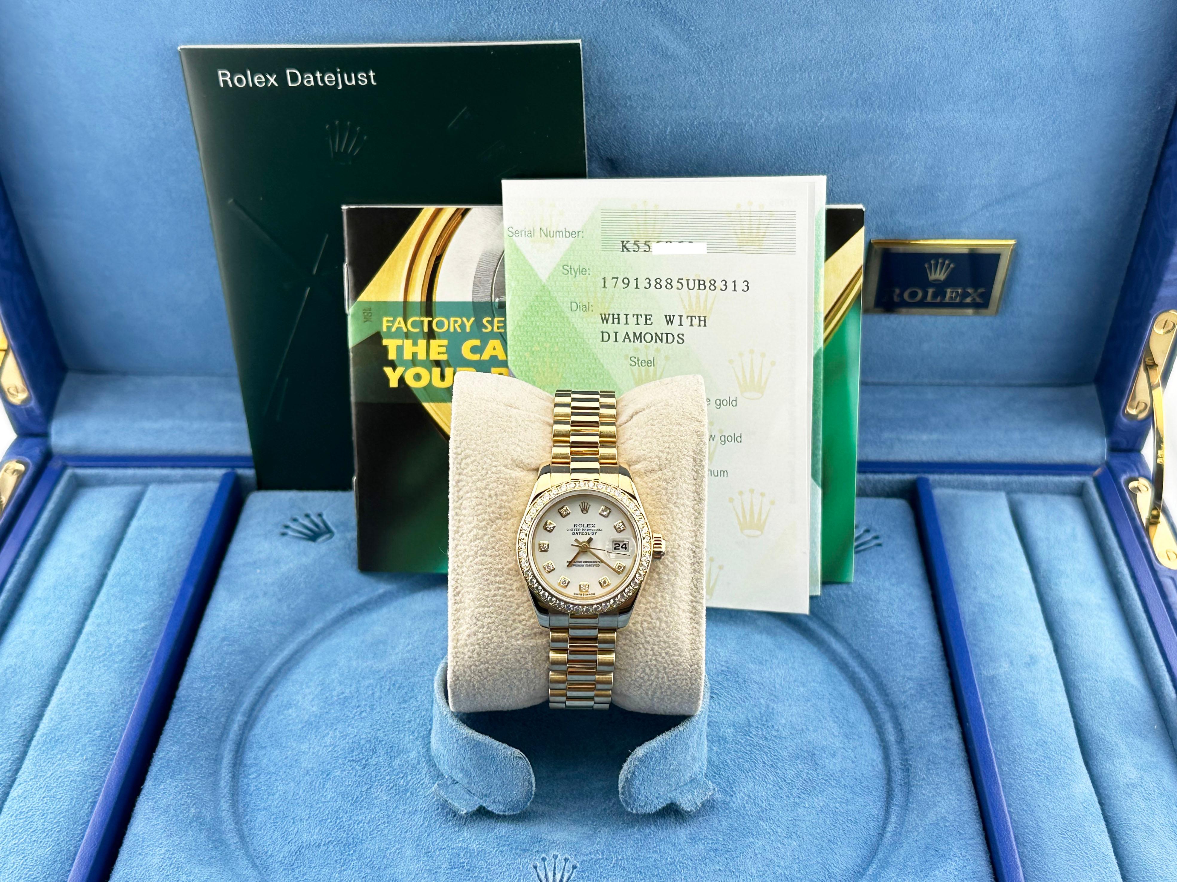 Style Number: 179138 



Serial: K556***



Year: 2005

 

Model: Rolex Ladies Datejust President 

 

Case Material: 18K Yellow Gold 

 

Band: 18K Yellow Gold 

  

Bezel: Original Diamond Bezel 

  

Dial: Original White Diamond Dial 

 

Face: