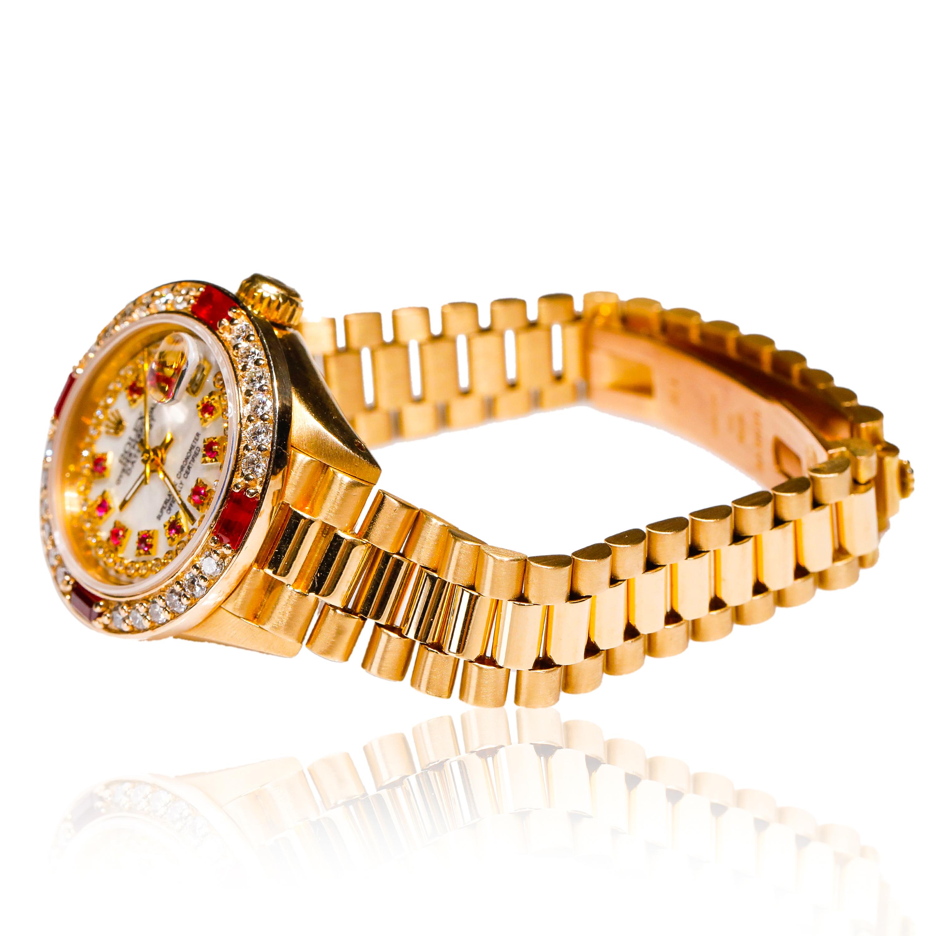 Rolex Ladies President 18k Yellow Gold Ruby Watch Mother of Pearl Diamond Dial

SKU: WA00001

PRIMARY DETAILS
Brand:  Rolex
Model: ROLEX 18k YELLOW GOLD LADIES PRESIDENT
Country of Origin: Switzerland
Movement Type: Automatic
Year of Manufacture:
