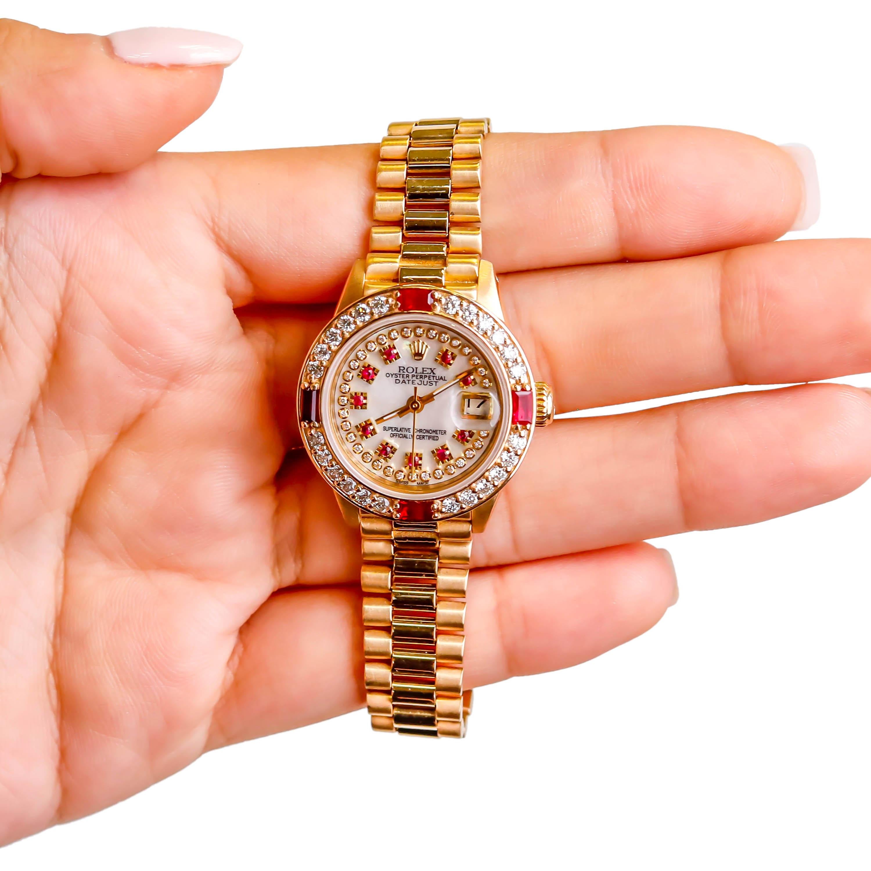 Rolex Ladies President 18 Karat Gold Ruby Watch Mother of Pearl Diamond Dial In Excellent Condition For Sale In New York, NY