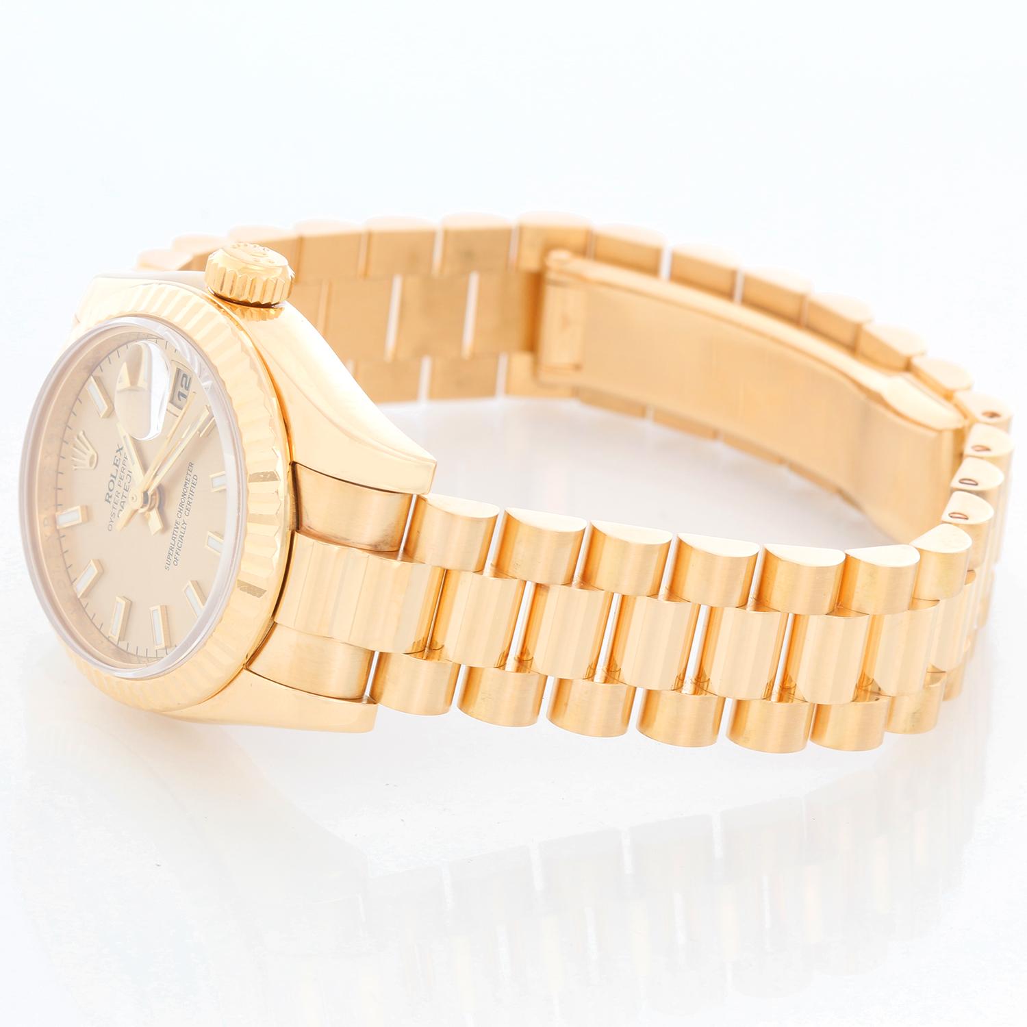 Rolex Ladies President 18k Yellow Gold Watch 179178 - Automatic winding, 31 jewels, Quickset date, sapphire crystal. 18k yellow gold case with fluted  bezel (26 mm ). Factory champagne dial. 18k yellow gold Rolex hidden-clasp President bracelet.