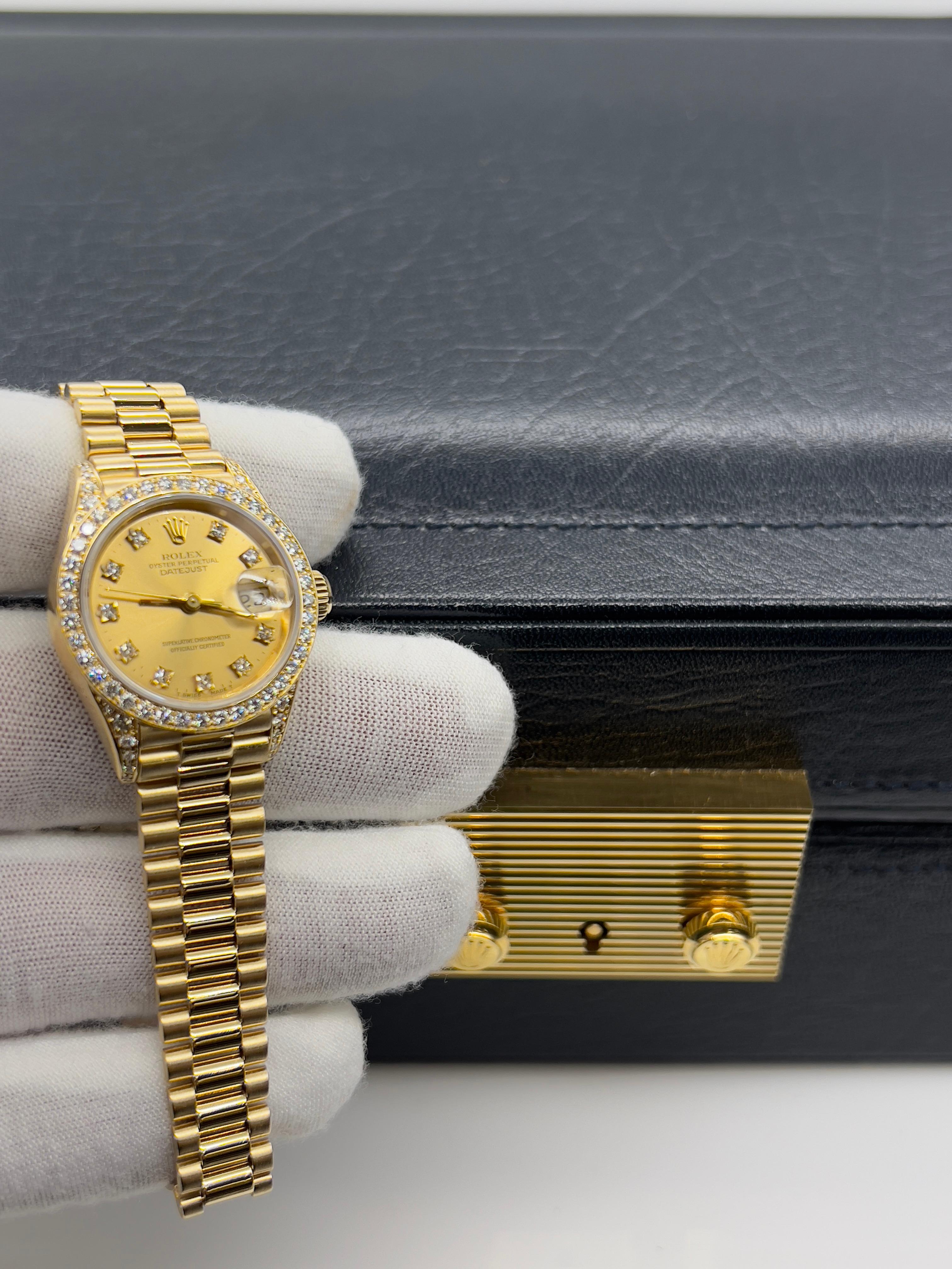 Style Number: 69158
Serial: E443***
Year: 1990
Model: Ladies President Crown Collection
Case Material: 18K Yellow Gold Factory Diamond Lugs
Band: 18K Yellow Gold
Bezel: Factory Diamond Bezel
Dial: Factory Diamond Dial
Face: Sapphire Crystal
Case