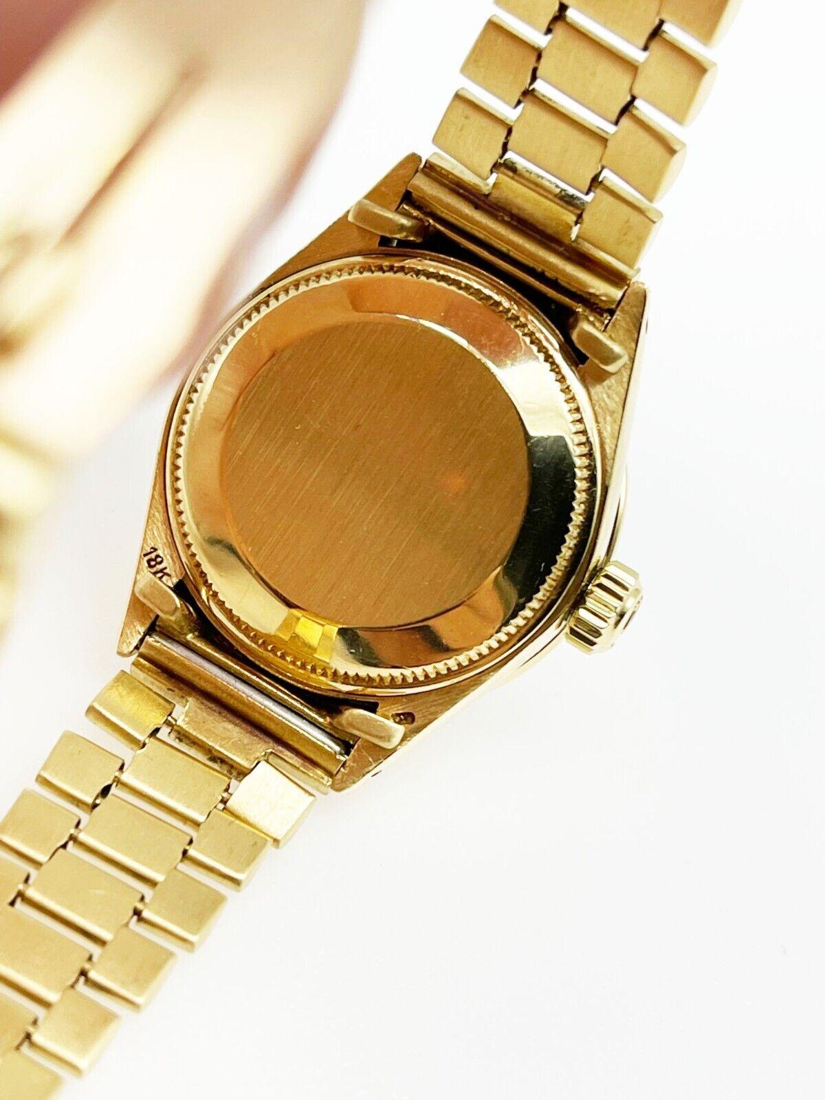 Style Number: 6917

 

Serial: 3407***



Model: Ladies President

 

Case Material: 18K Yellow Gold

 

Band: 18K Yellow Gold

 

Bezel:  Custom diamond bezel

 

Dial: Champagne custom diamond marker dial

 

Face: Acrylic

 

Case Size: 26mm

