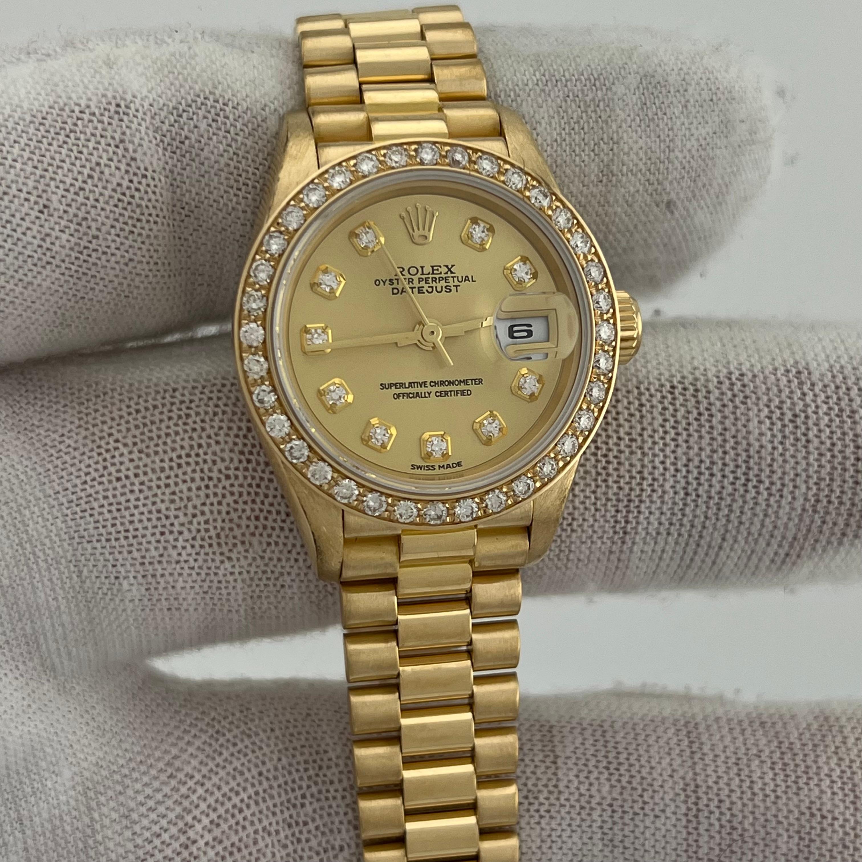 Style Number: 79178



Serial: K706***



Year: 2001

 

Model: Rolex Ladies President

 

Case Material: 18K Yellow Gold

 

Band: 18K Yellow Gold

  

Bezel: Factory Rolex Diamond Bezel

 

Dial: Factory Rolex Diamond Dial

 

Face: Sapphire