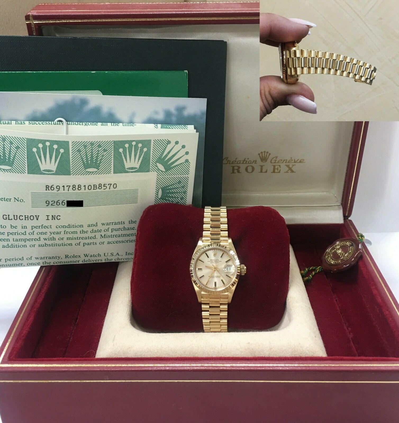 Style Number: 69178
Serial: 9266***
Model: Ladies President Datejust
Case Material: 18K Yellow Gold
Band: 18K Yellow Gold
Bezel: 18K Yellow Gold
Dial: Champagne
Face: Sapphire Crystal 
Case Size: 26mm
Includes: 
-Rolex Box & Papers
-Certified