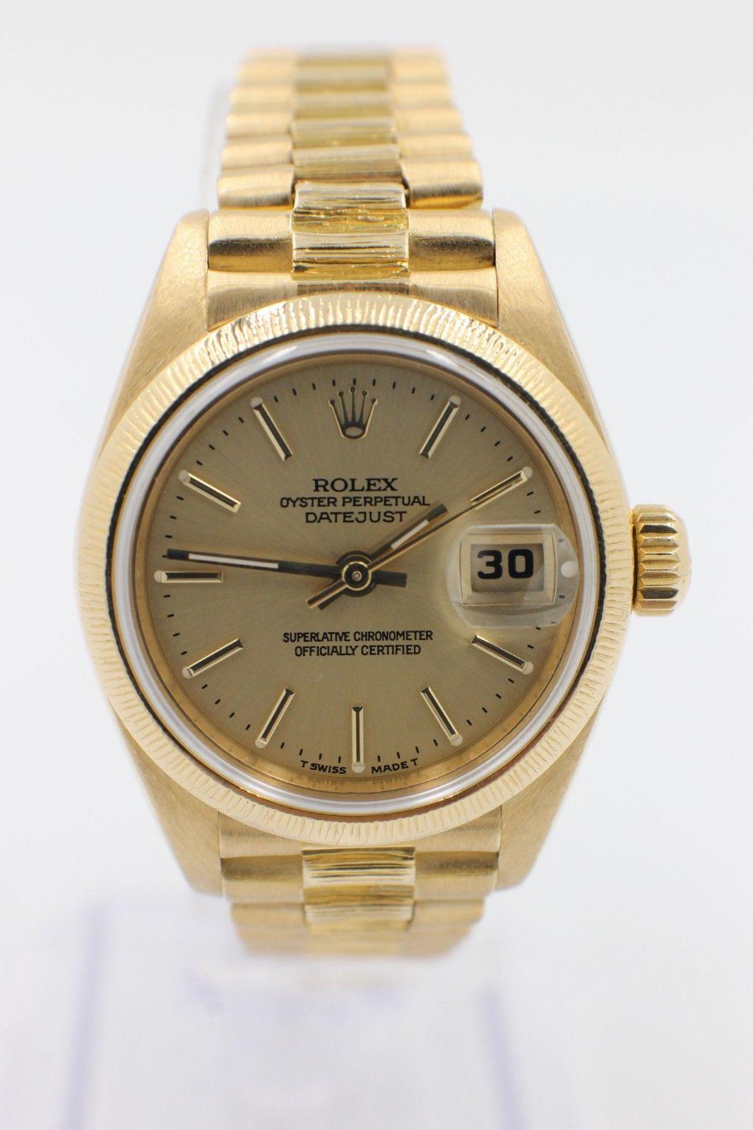 Style Number: 69278

Serial: 7660**

Model: Datejust Ladies President 

Case: 26mm

Band: 18K Yellow Gold

Bezel: 18K Yellow Gold

Dial: Champagne

Face: Acrylic

Case Size:

Includes: 

-Elegant Watch Box

-Certified Appraisal 

-6 Month Warranty