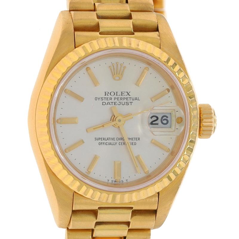 Marke: Rolex
Modell: Damen Präsidentin
Modellnummer: 69178
Uhrwerk: Automatik
Garantie: Ein Jahr
Jahr: 1984
Uhrwerk-Hersteller: Schweiz
Zifferblattfarbe: Silber

Metallgehalt: 18k Gelbgold

Verschluss-Typ: Fold-Over-Verschluss
Merkmale: 
Geriffelte