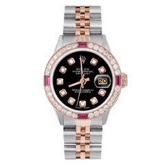 Rolex Ladies Rose Gold Datejust Black Diamond Dial Ruby / Diamond Bezel Watch