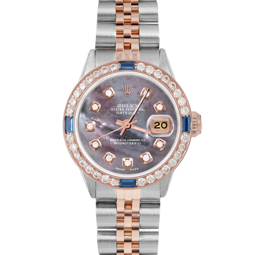 Brand : Rolex

Model : Datejust (Non-Quickset Model)

Gender : Ladies

Metals : Rose Gold/Stainless Steel

Case Size : 26 mm

Dial : Custom Black Mother of Pearl Diamond Dial (This dial is not original Rolex And has been added aftermarket yet is a