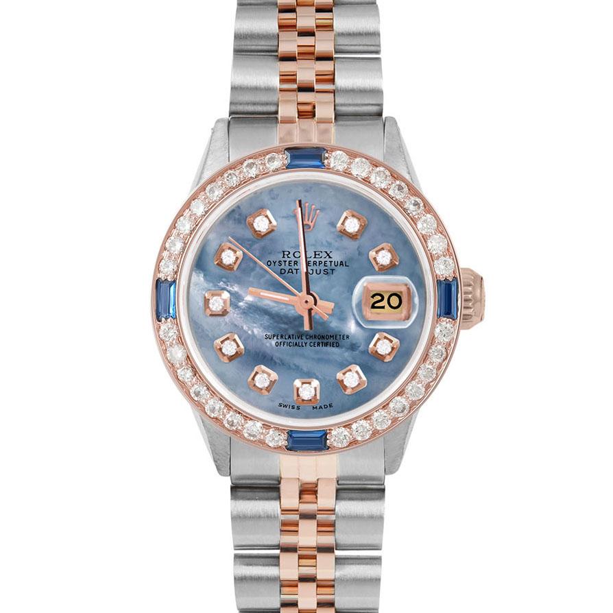 Brand : Rolex

Model : Datejust (Non-Quickset Model)

Gender : Ladies

Metals : Rose Gold/Stainless Steel

Case Size : 26 mm

Dial : Custom Blue Mother of Pearl Diamond Dial (This dial is not original Rolex And has been added aftermarket yet is a