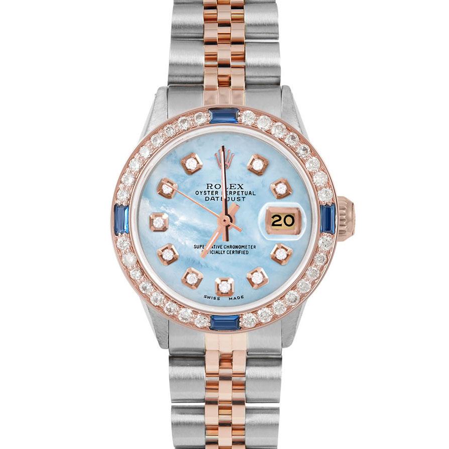Brand : Rolex

Model : Datejust (Non-Quickset Model)

Gender : Ladies

Metals : Rose Gold/Stainless Steel

Case Size : 26 mm

Dial : Custom Blue Mother of Pearl Diamond Dial (This dial is not original Rolex And has been added aftermarket yet is a