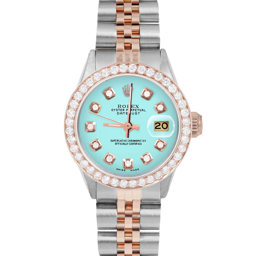 Brand : Rolex

Model : Datejust (Non-Quickset Model)

Gender : Ladies

Metals : Rose Gold/Stainless Steel

Case Size : 26 mm

Dial : Custom Turquoise Diamond Dial (This dial is not original Rolex And has been added aftermarket yet is a beautiful