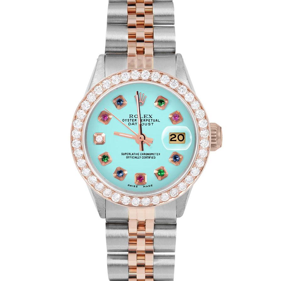 Brand : Rolex

Model : Datejust (Non-Quickset Model)

Gender : Ladies

Metals : Rose Gold/Stainless Steel

Case Size : 26 mm

Dial : Custom Turquoise Rainbow Dial (This dial is not original Rolex And has been added aftermarket yet is a beautiful