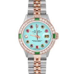 Rolex Ladies Rose Gold Datejust Turquoise Rainbow Dial Emerald / Diamond Bezel