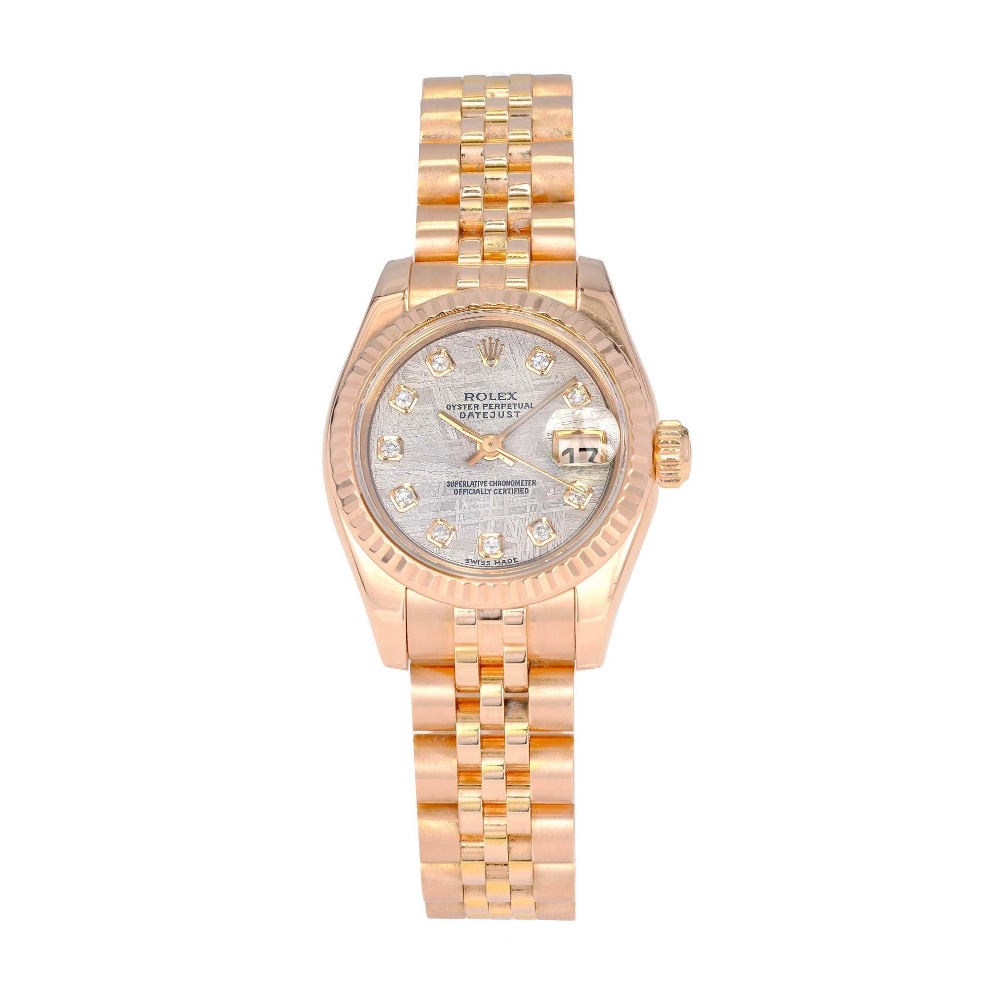 18k rose gold ladies datejust Rolex with fluted bezel. Metorite dial with diamonds.

Length: 7 inches
Width: 26mm
Band Width at Case: 12.5mm
Band: 18k rose gold jubilee
Crystal: sapphire
Dial: meteorite dial with 10 diamonds
Case: 18k rose gold with