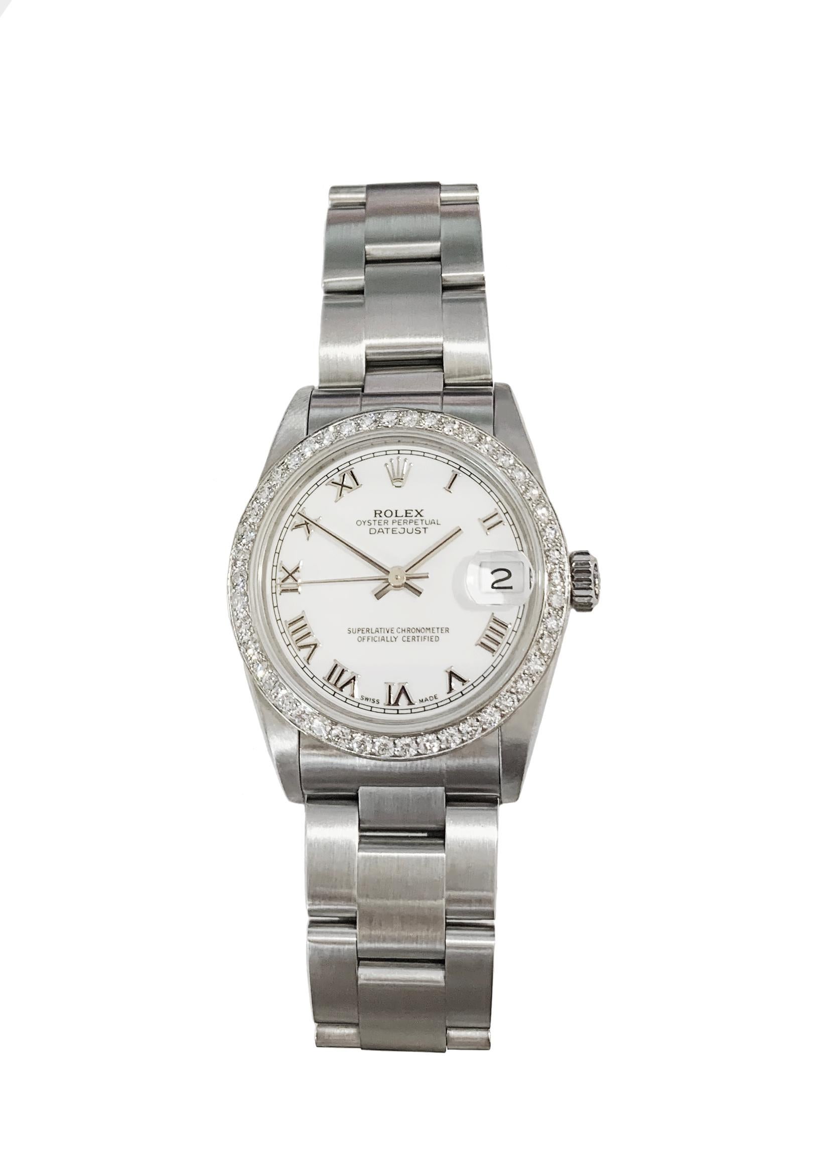 -Year: 1997
-Mint condition
-Case size: 31mm
-Dial: White 
-Crystal: Sapphire
-Oyster bracelet 
-Aftermarket Diamond Bezel: 1.00ct, VS clarity, G color
-Comes with box, no papers 
