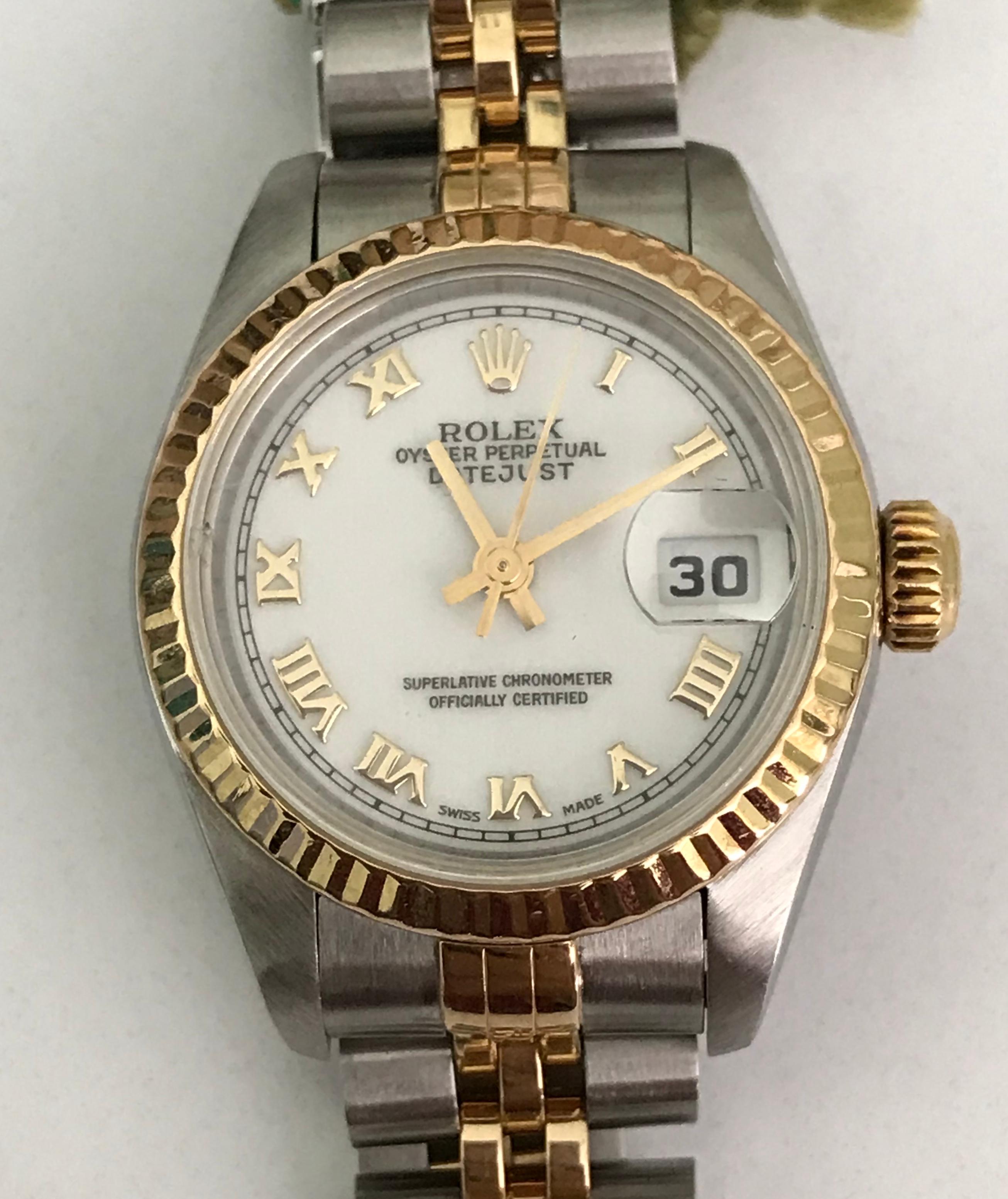 Rolex Ladies stainless   steel Oyster Perpetual datejust watch. It's an automatic wristwatch. 
Dial-- White Roman
Swiss made.
Serial # T763134
Superlative Chronologic