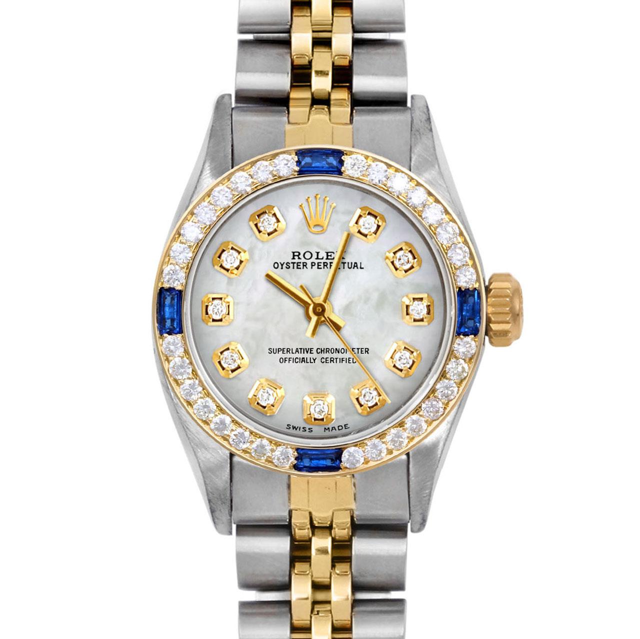 Brand : Rolex
Model : Oyster Perpetual 
Gender : Ladies
Metals : 14K Yellow Gold / Stainless Steel
Case Size : 24 mm
Dial : Custom Mother Of Pearl Diamond Dial (This dial is not original Rolex And has been added aftermarket yet is a beautiful Custom