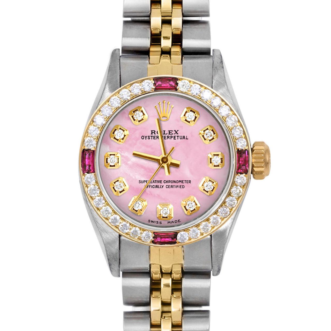 Brand : Rolex
Model : Oyster Perpetual 
Gender : Ladies
Metals : 14K Yellow Gold / Stainless Steel
Case Size : 24 mm
Dial : Custom Pink Mother Of Pearl Diamond Dial (This dial is not original Rolex And has been added aftermarket yet is a beautiful