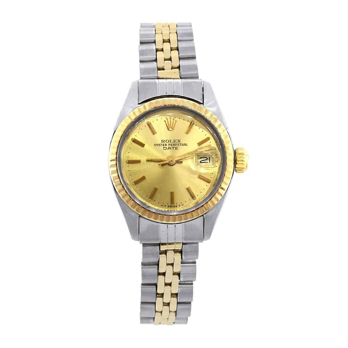 Brand: Rolex
MPN: 6917
Model: Date
Case Material: 18k yellow gold
Case Diameter: 26mm
Crystal: Plastic
Bezel: 18k yellow gold fluted bezel (factory)
Dial: Champagne stick dial with gold hour markers and hands and date window at 3 o’clock
Bracelet: