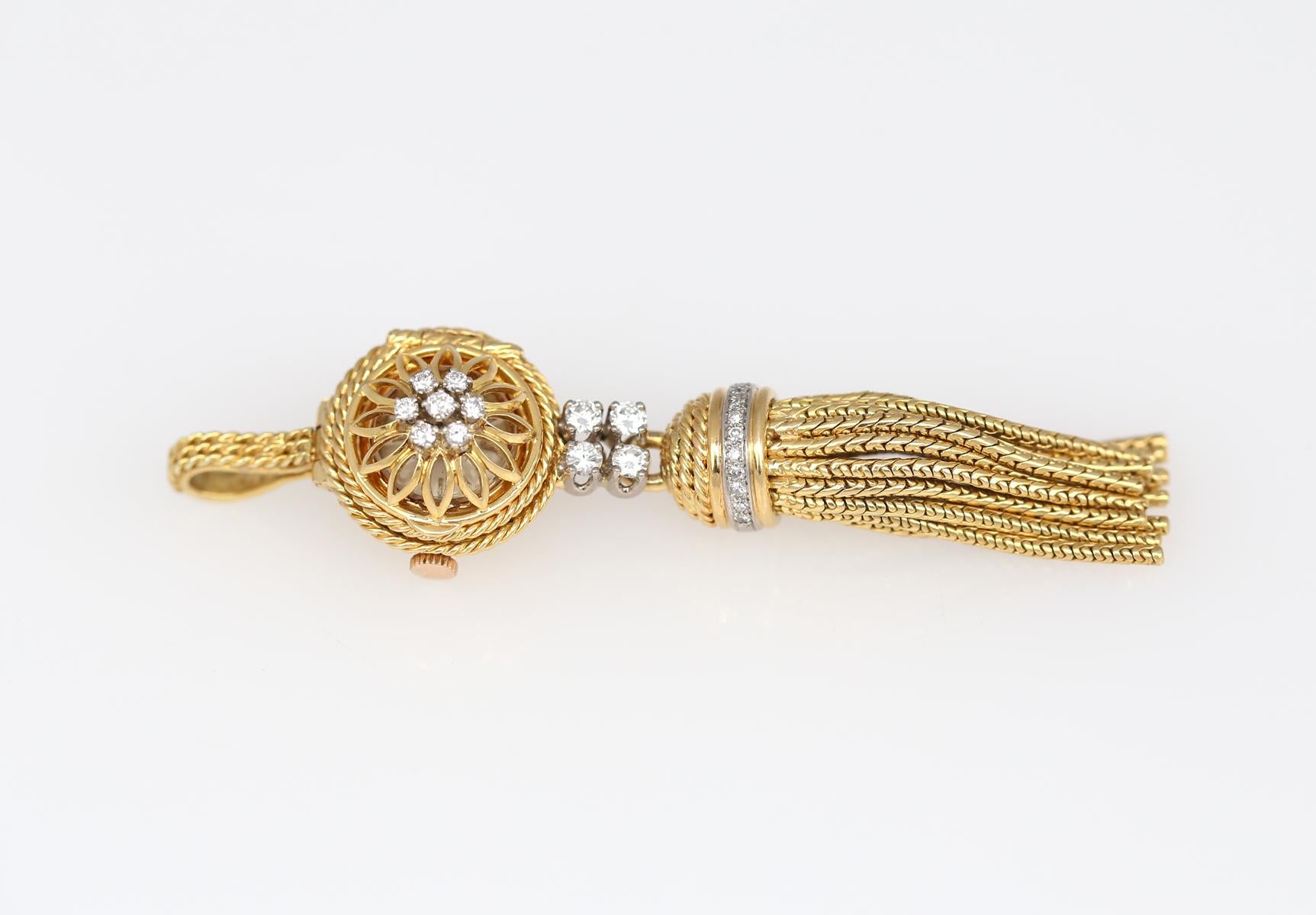 Rolex Ladies Pendant watch 18K Gold and Fine Diamonds. Extremely rare jewelry item, Rolex has only produced a limited number of these pendants for special clients. 
The delicate cover with small Diamonds opens to reveal a watch. Dial signed Rolex