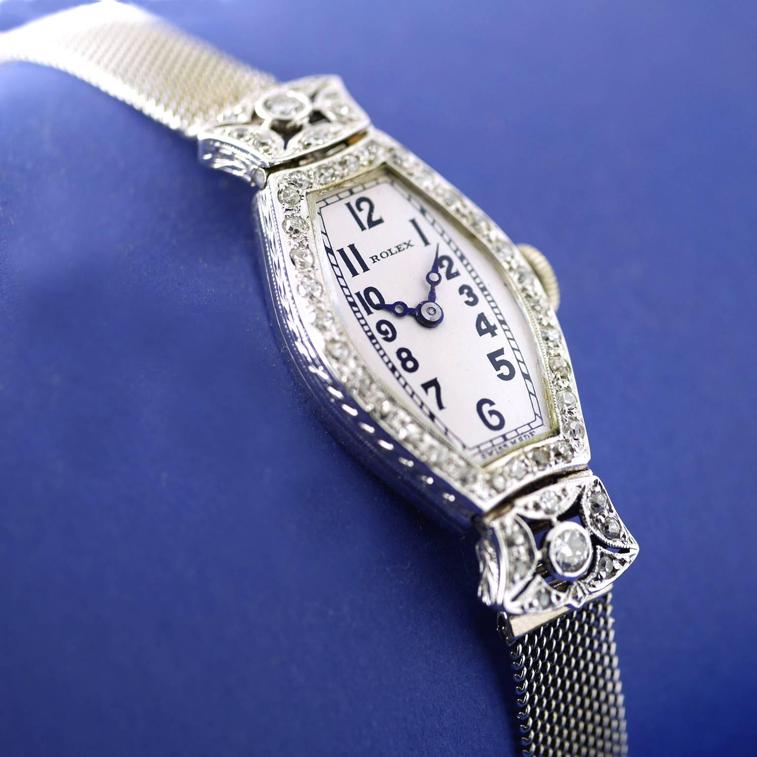 A rare Art Deco diamond wristwatch by Rolex made in 1926 .

The 18 carat white gold case is set with diamonds, chased detail on the sides, marked on the inside case back with “7 World’s Records