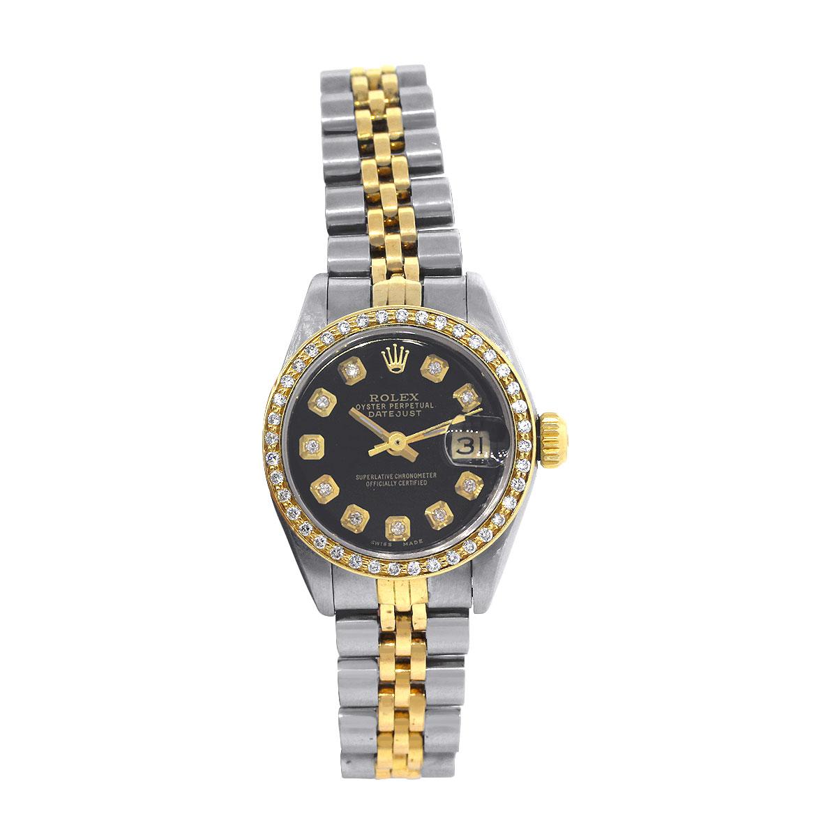 Brand: Rolex
MPN: 69173
Model: Datejust
Case Material: 18k yellow gold
Case Diameter: 26mm
Crystal: Sapphire
Bezel: Aftermaker 18k yellow Diamond bezel
Dial: Aftermarket black dial with diamond hour markers and gold hands; date window at 3