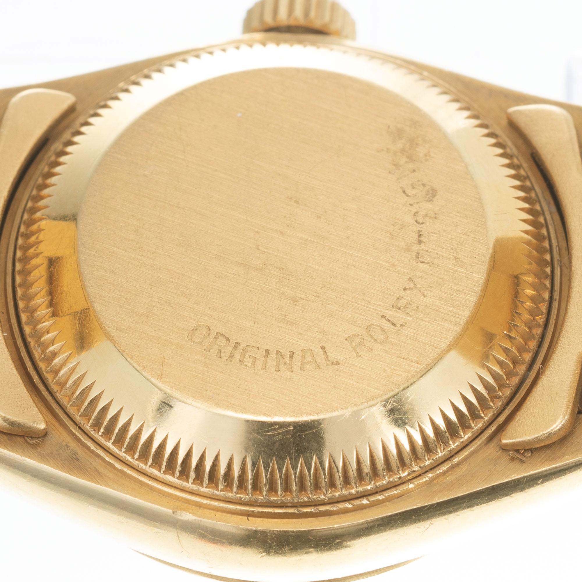Round Cut Rolex Ladies Yellow Gold Diamond Dial Datejust Wristwatch Ref 69178