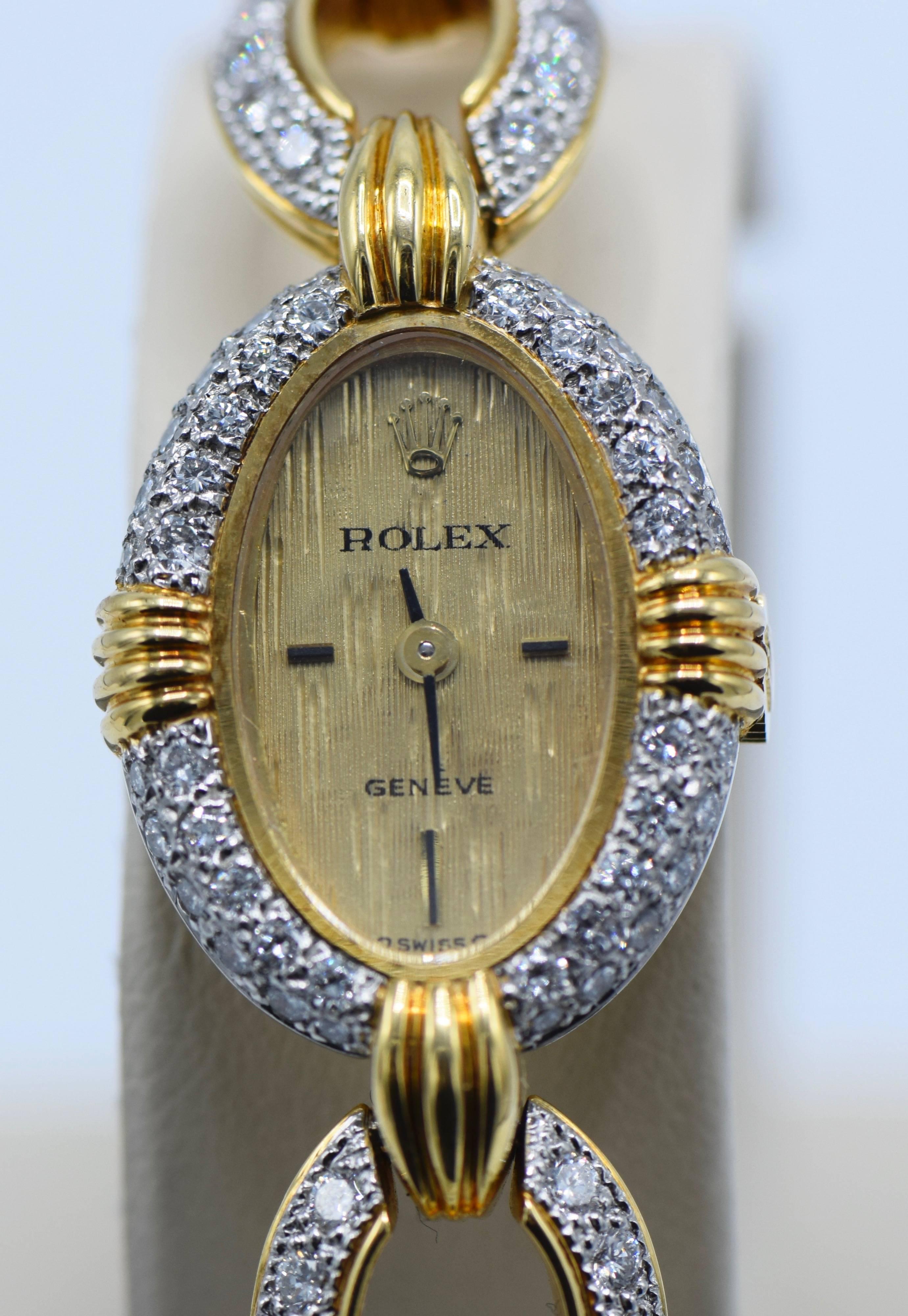 18 kt., mechanical, dia. ap. 22.5 x 19.0 mm., 144 round diamonds ap. 3.65 cts., dial & movement signed Rolex, Geneve, Swiss, case no. 370216, with maker's marks, ap. 44 dwts. gross.

Color: G-H

Clarity: VS. 

Case diameter 7/8 x 11/16 inch.