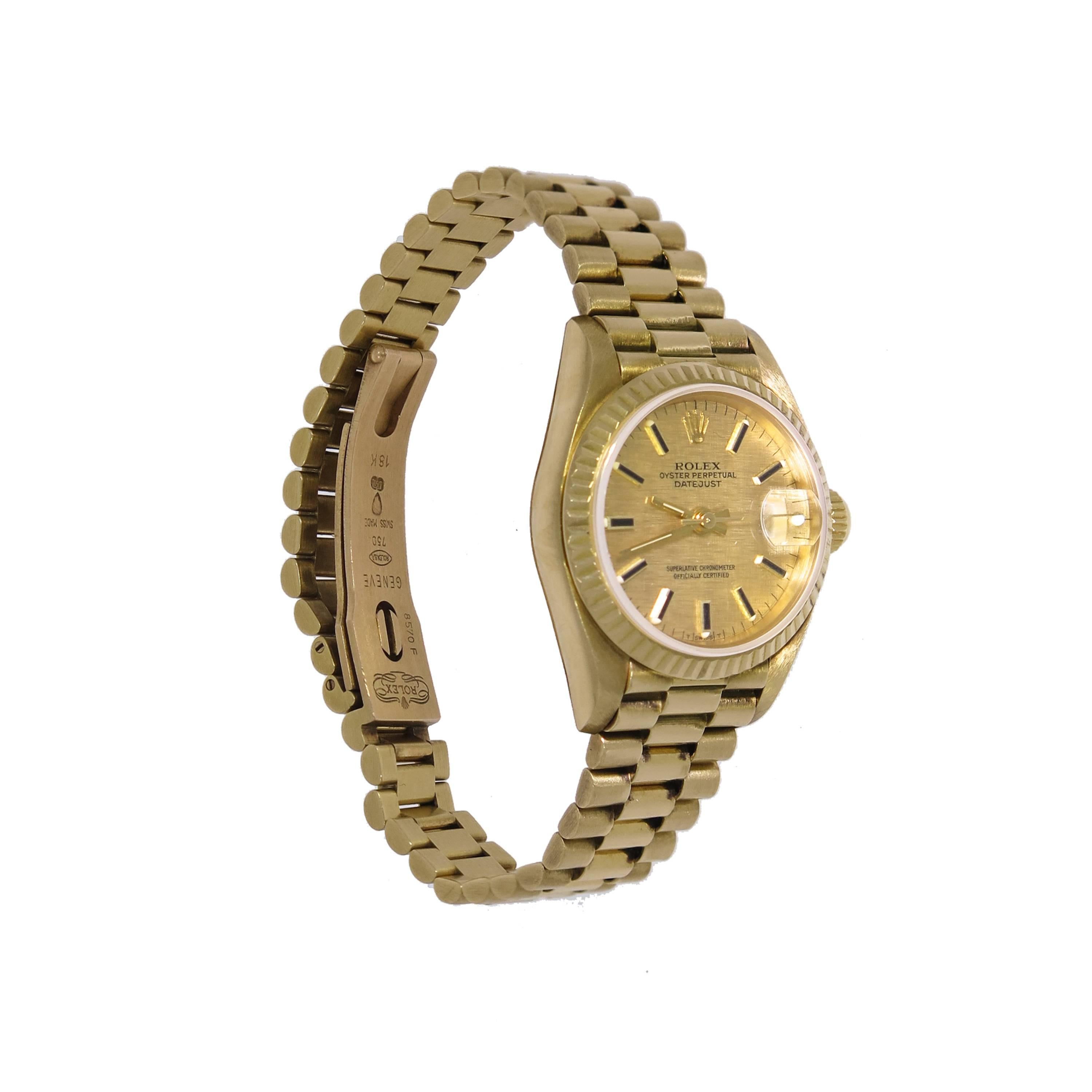 This classic Rolex President lady's wristwatch known to be worn by many world leaders, is crafted in 18k yellow gold. This timepiece features a self-winding movement with indications for the Hours, Minutes, Seconds and Date. The case measures 26mm
