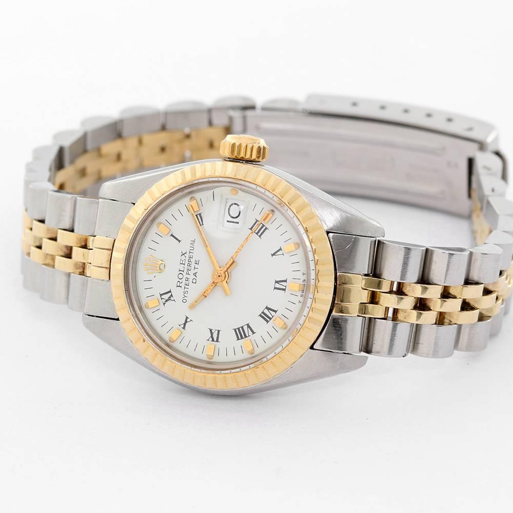 Rolex Ladies Date Stainless Steel & 14k Gold Watch 6917  - Automatic winding, Acrylic crystal. Stainless steel case with 14k gold fluted bezel (26mm diameter). White dial with gold markers & Roman numerals. Stainless steel and 14k gold Jubilee
