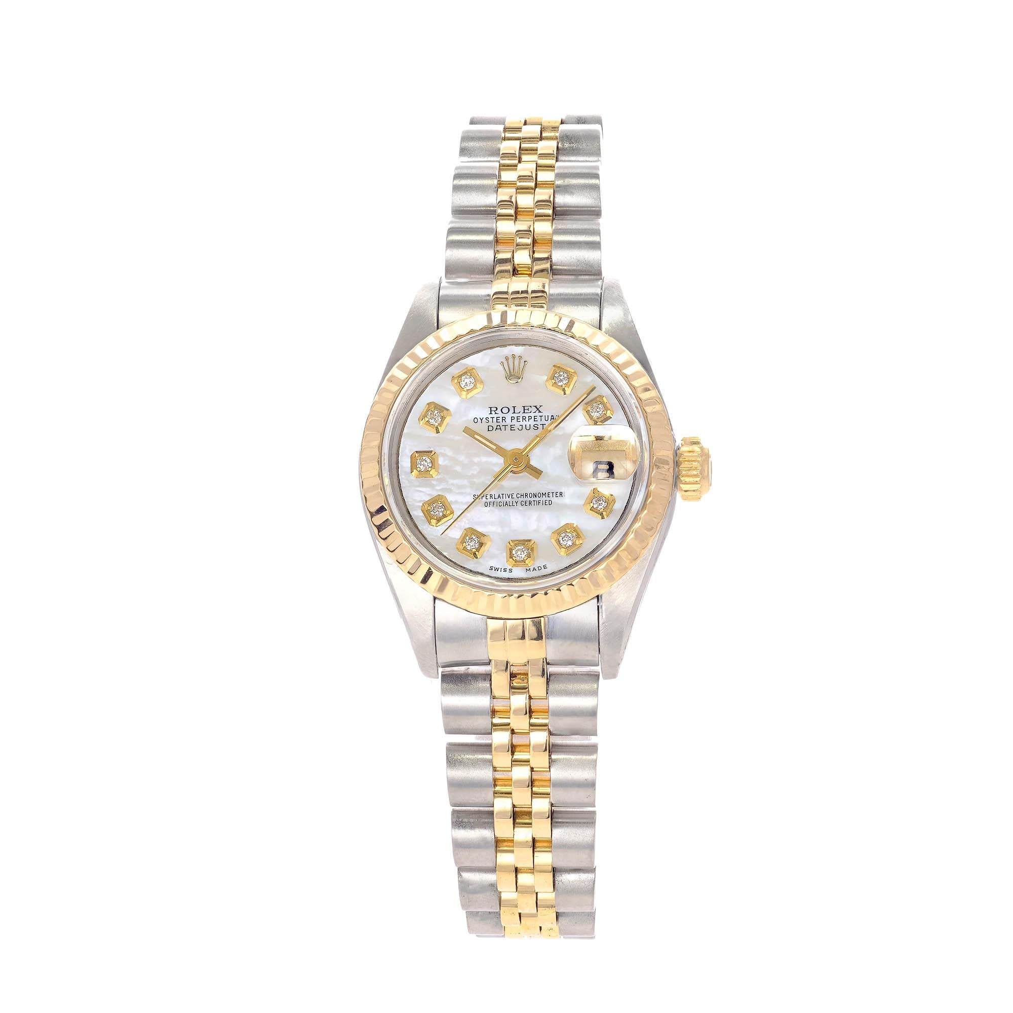 Rolex date just ladies 18k yellow gold and stainless-steel wristwatch with white mother of pearl and diamond dial and fluted bezel.

Length: 6 ½ - 7 Inches
Width: 26mm
Band Width Case: 12.5mm
Band: 18k yellow gold Stainless Steel jubilee
Crystal: