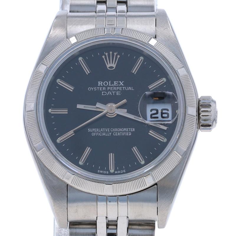 Brand: Rolex
Model: Lady Date
Model Number: 79190
Movement: Automatic
Number of Jewels: 31
Warranty: One Year
Year: 2000
Movement Maker: Swiss
Dial Color: Black

Metal Content: Stainless Steel

Fastening Type: Fold-Over Clasp
Features: 
Etched bezel