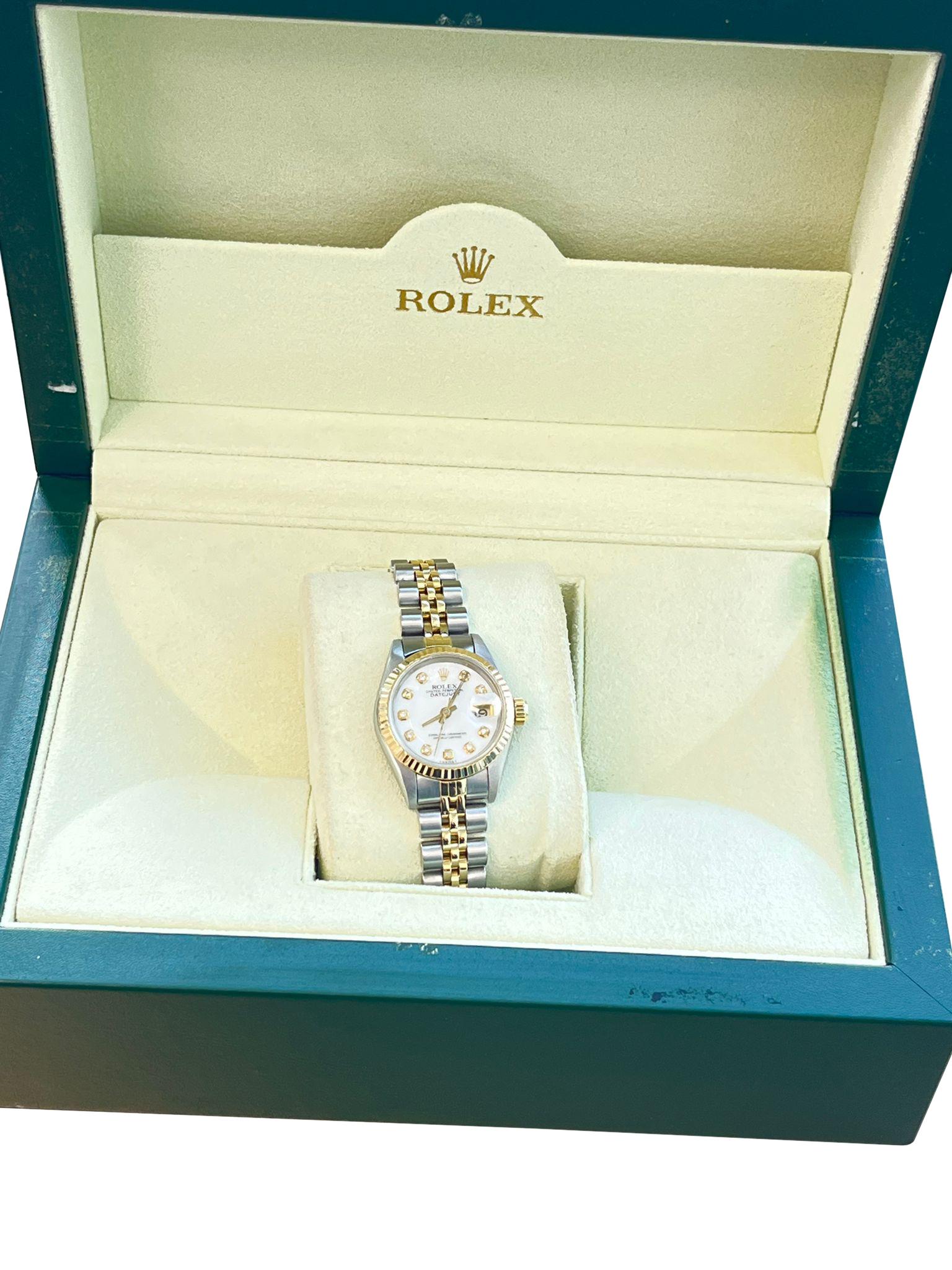 This stunning Rolex Oyster Perpetual Datejust watch has an 18K yellow gold Rolex fluted bezel, a white Dial: Aftermarket diamond dial, and a Rolex 18K yellow gold & stainless steel jubilee bracelet.

Details:
Brand: Rolex
Model Name: Ladies