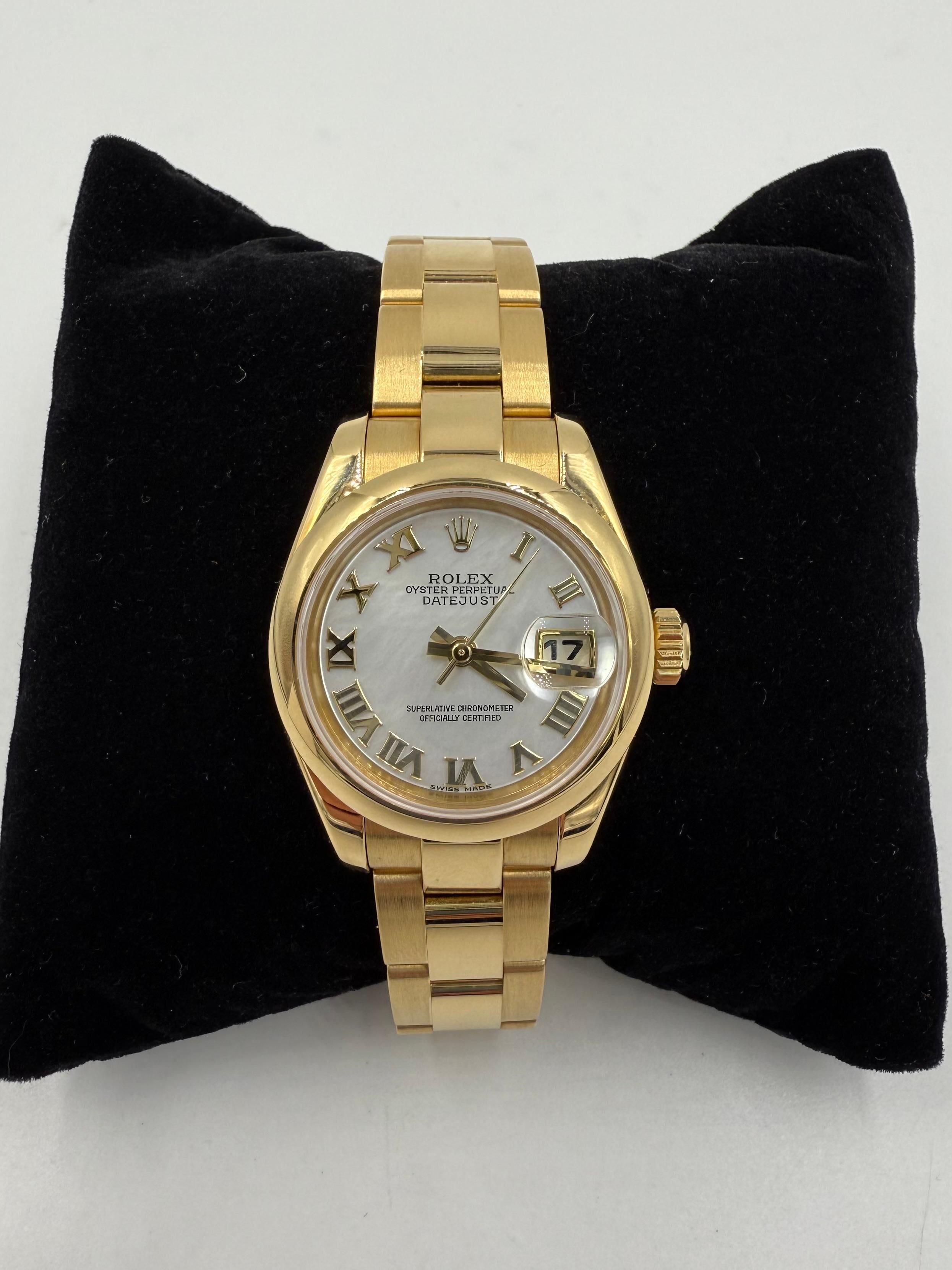 Rolex Lady Datejust 18k Yellow Gold Wristwatch.

This Rolex Lady Datejust 18k Yellow Gold Wristwatch was made in 2001.  It is is very good condition with very little signs of wear.  The model # is 179168 with the 26mm case.  And the Roman Numeral