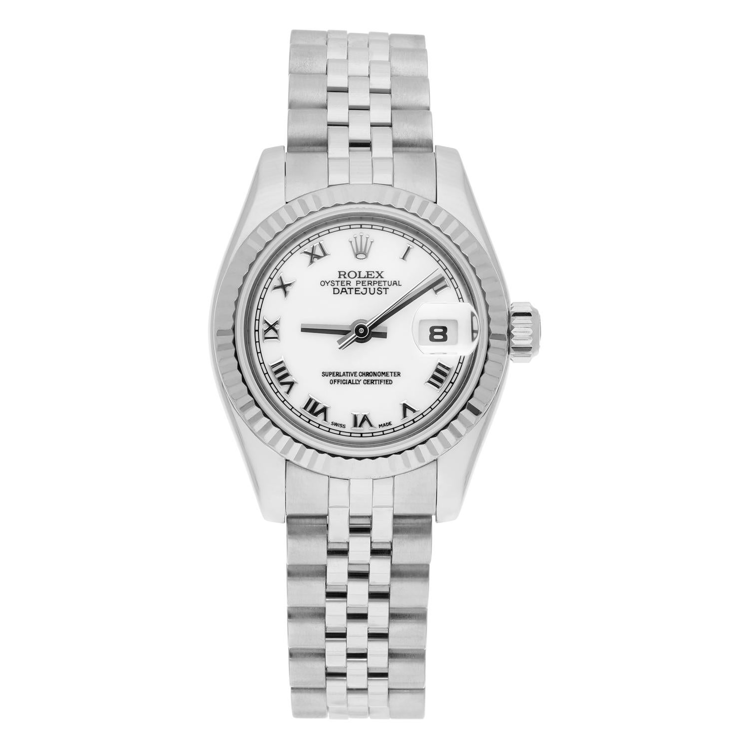 Introducing the stunning Rolex Lady-Datejust 179174 wristwatch, a timeless piece that exudes luxury and sophistication. This Swiss-made watch features a round 26mm case made of stainless steel and a white gold fluted bezel. The elegant white dial