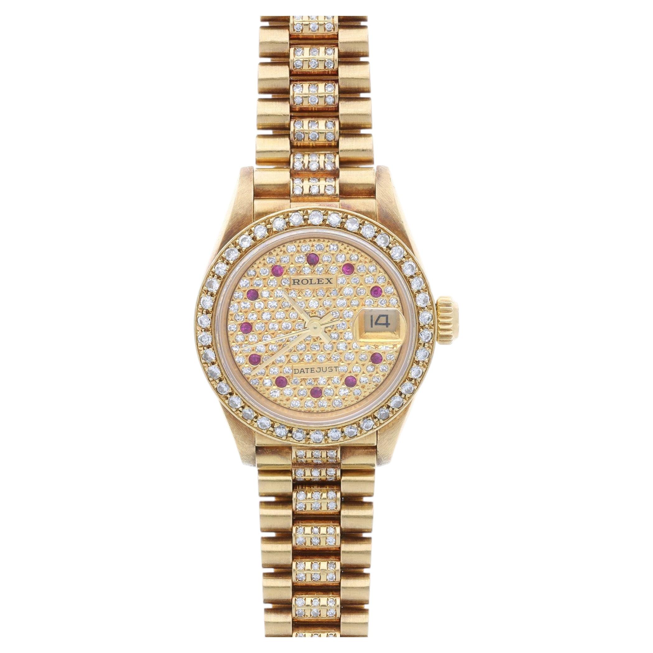 Rolex Lady Datejust 26mm or jaune 18K diamant rubis pavé cadran montre président