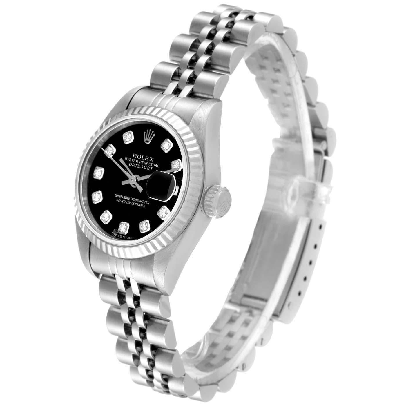 Rolex Datejust 26mm Steel White Gold Black Diamond Dial Ladies Watch 79174. Mouvement chronométrique à remontage automatique. Boîtier oyster en acier inoxydable de 26.0 mm de diamètre. Logo Rolex sur une couronne. Lunette cannelée en or blanc 18K.