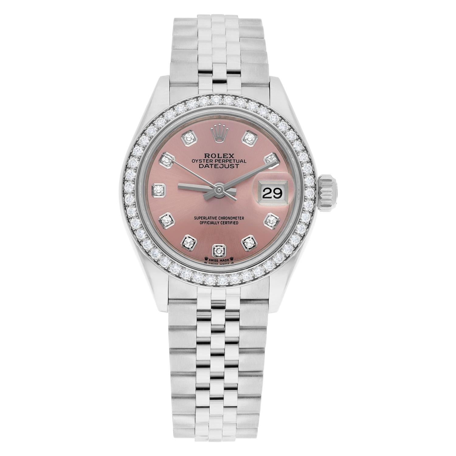 Guaranteed Authentic Rolex Lady-Datejust with a 28mm stainless steel case and a Factory Pink Diamond dial. This watch is waterproof up to 100 meters and features a date indicator, Factory 18K White Gold Diamond bezel, and stainless steel Jubilee