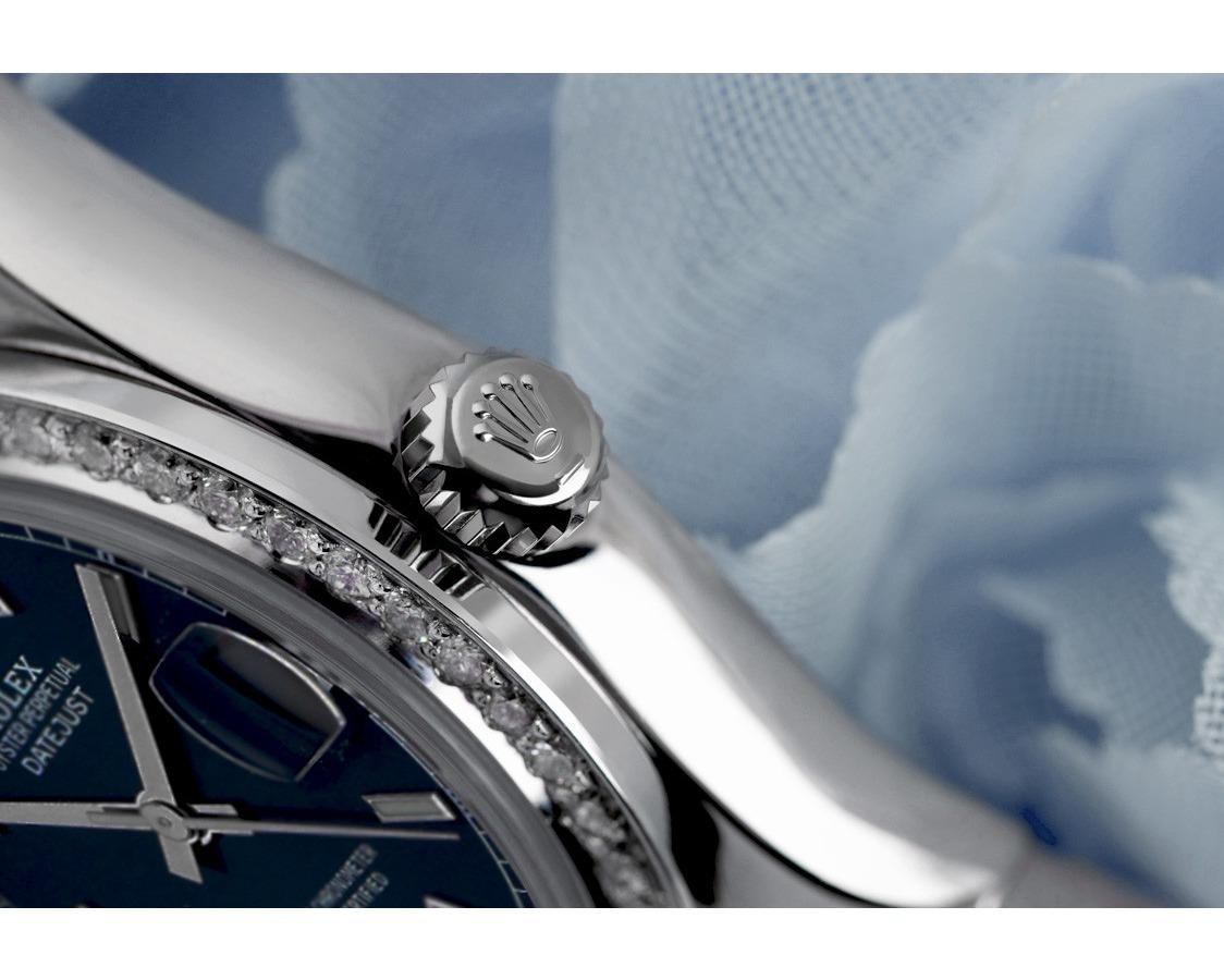 Rolex Lady-Datejust 31mm en acier inoxydable, cadran à index bleu avec lunette à diamants, Oyster 178240

Véritable Rolex Datejust 31 mm en acier inoxydable avec cadran d'usine et lunette en diamant personnalisée. Elle a été polie, entretenue et il