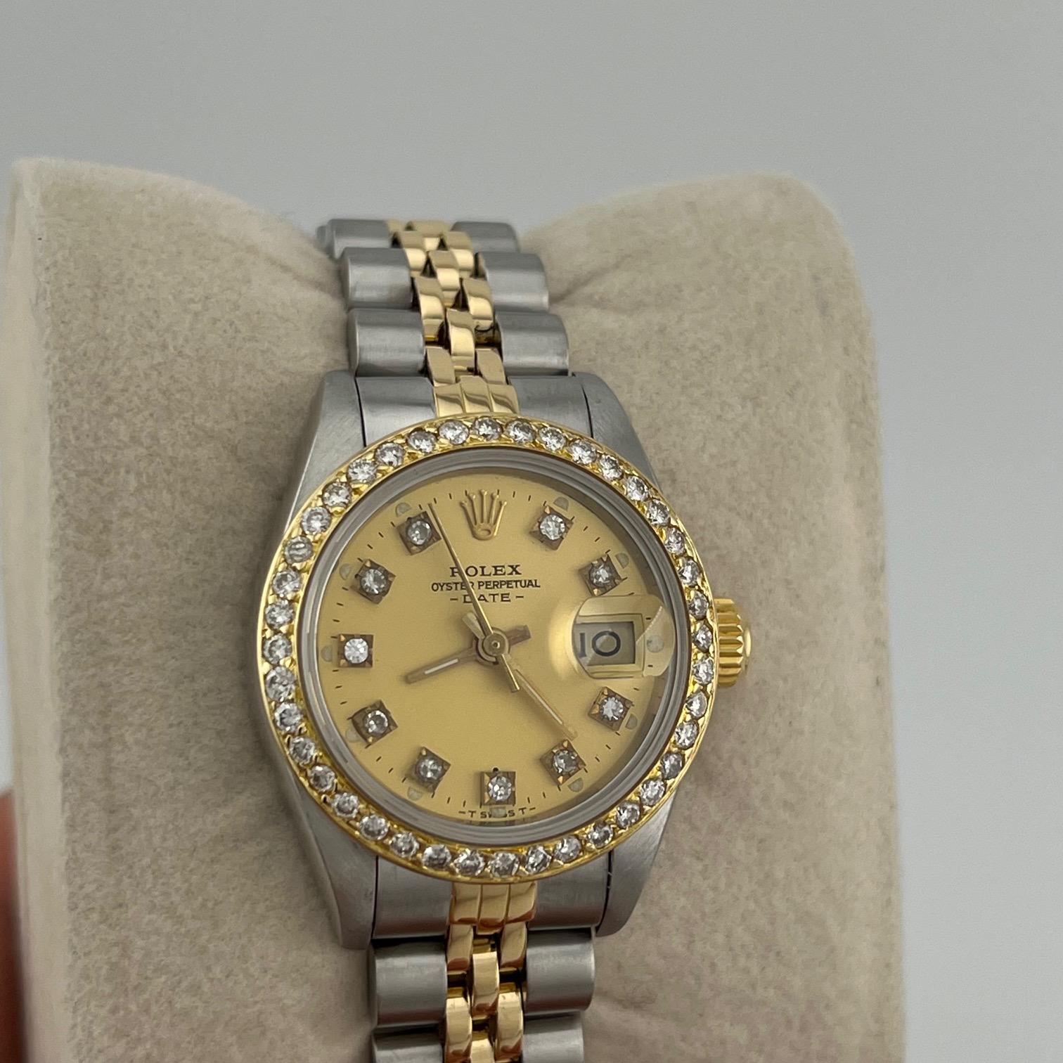 Stil Nummer: 69173

Seriennummer: 981****

Jahr: 1987
 
Modell: Rolex Damen Datejust 
 
MATERIAL des Gehäuses: Rostfreier Stahl 
 
Band: 18k Gelbgold & Edelstahl Jubilee
  
Lünette: Kundenspezifische Diamantlünette
  
Zifferblatt: Individuelles
