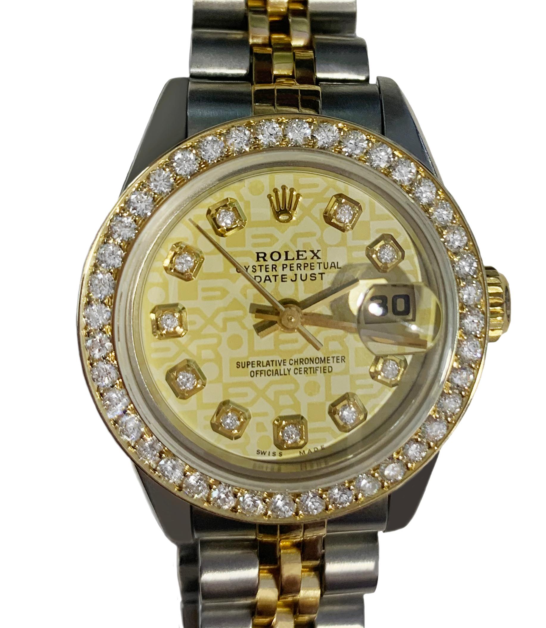 Mint condition
-Case size: 26mm
-Stainless steel & 18k Yellow gold
-Aftermarket Diamond Bezel: 1.00ct, VS/ E-F
-Aftermarket Diamond Dial
-Date indicator
-Comes with Box, no papers