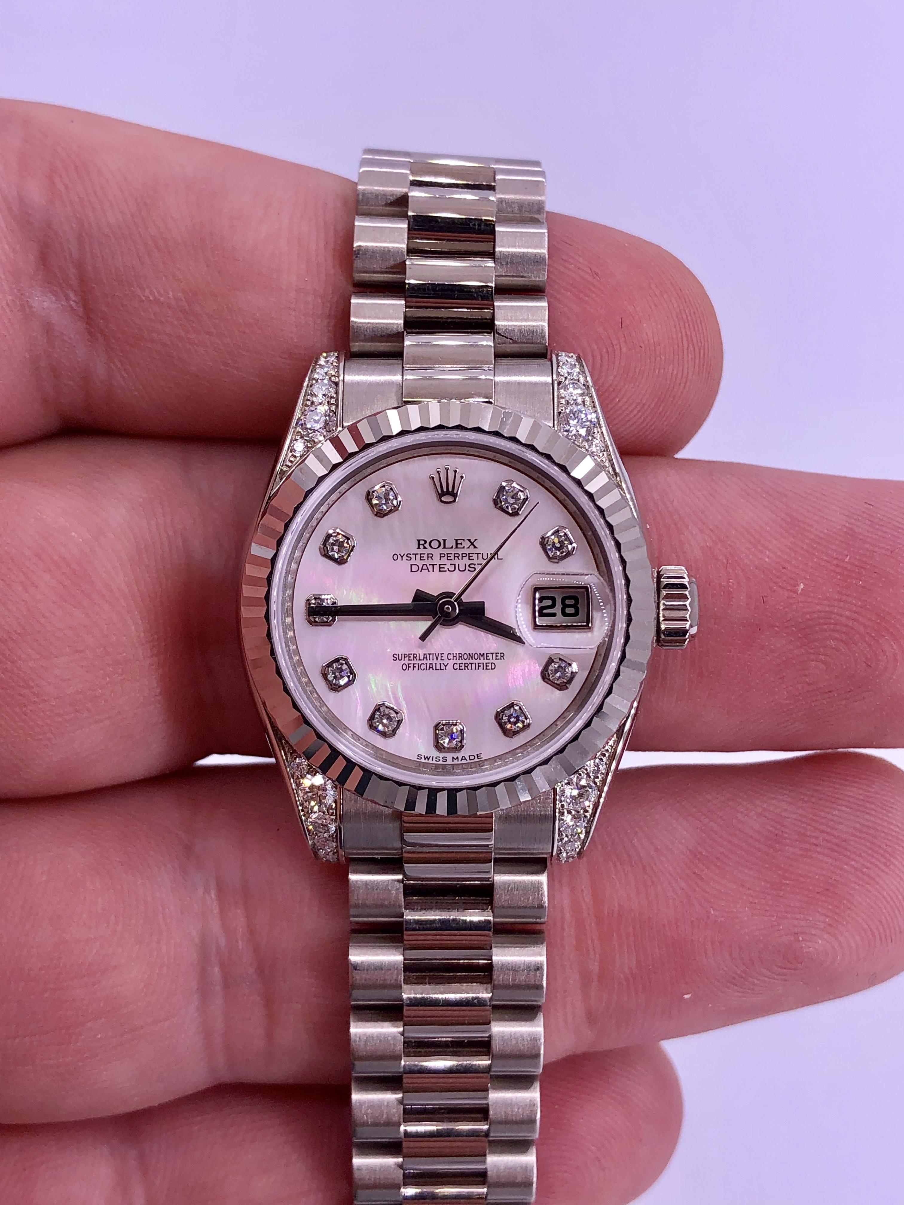 Factory set diamonds

BRAND: Rolex
MODEL: Lady-Datejust
REFRENCE: 179239
SIZE: 26mm
CASE: White Gold
DIAL: Mother of Pearl with Diamonds
BEZEL: White Gold
BAND: President White Gold
MOVEMENT: Automatic

New

Accommodated with an up to date digital