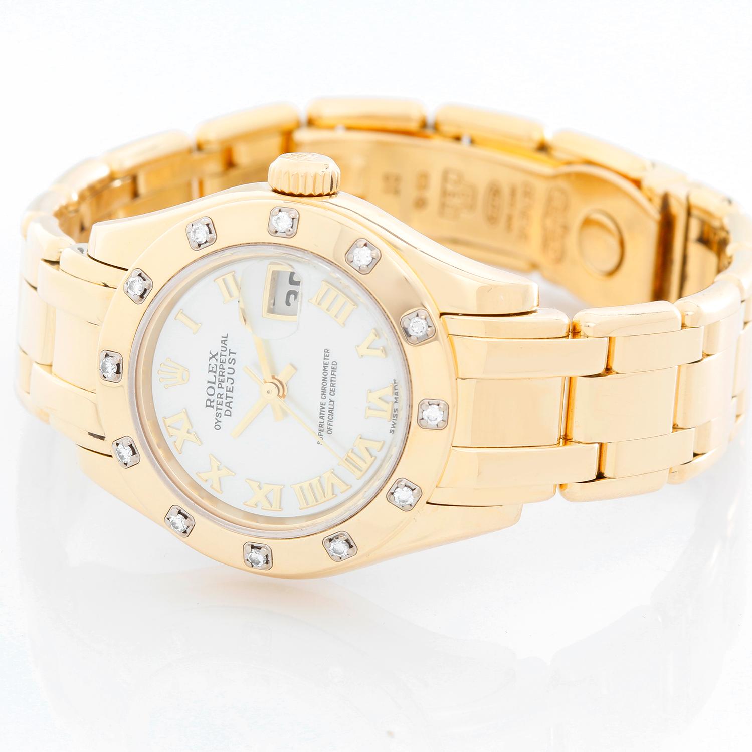 Rolex Lady Datejust Pearlmaster 18k Yellow Gold Ladies Diamond Watch 80318 - Automatic winding, 31 jewels, Quickset, sapphire crystal. 18k yellow gold case with factory 12 diamond bezel (29mm diameter). Genuine Rolex Mother of Pearl dial with Roman