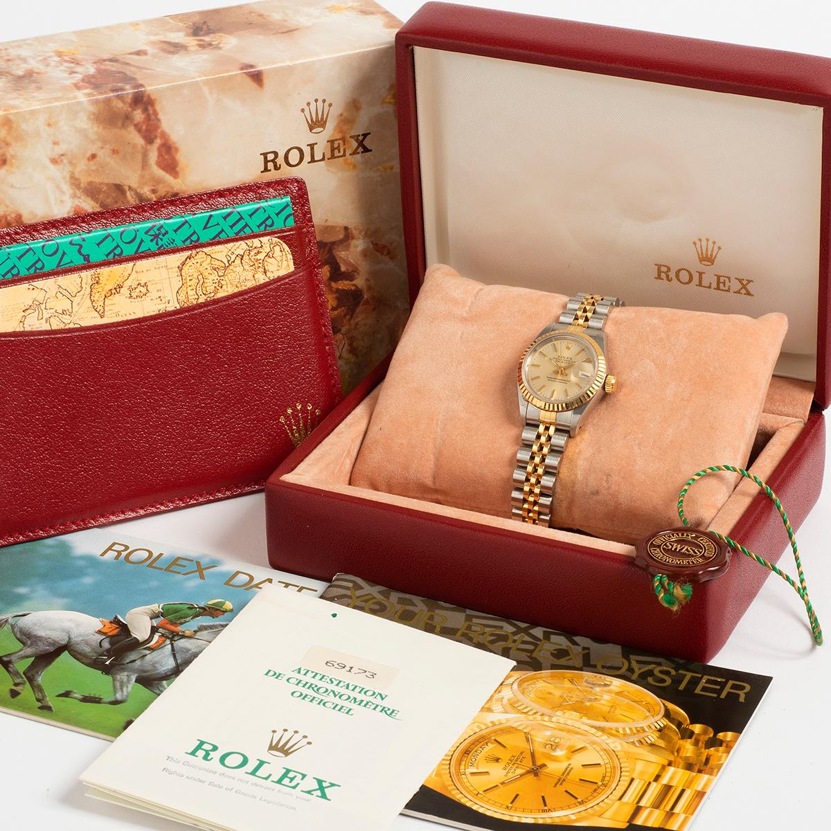 Our Rolex Lady Datejust reference 69173 features the classical combination of 18k yellow gold and stainless steel 26mm case with 18k yellow gold and stainless steel jubilee bracelet and also features an attractive champagne dial. This Lady Datejust