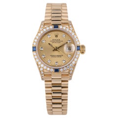 Rolex Lady DateJust Lunetta e spalle in zaffiro e diamanti 69158 Quadrante Champagne