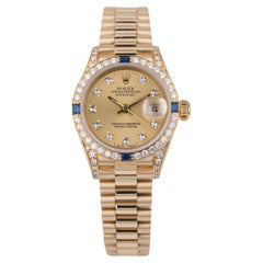 Rolex Lady DateJust  Saphir Diamant Lunette et épaulettes  Cadran champagne 69158