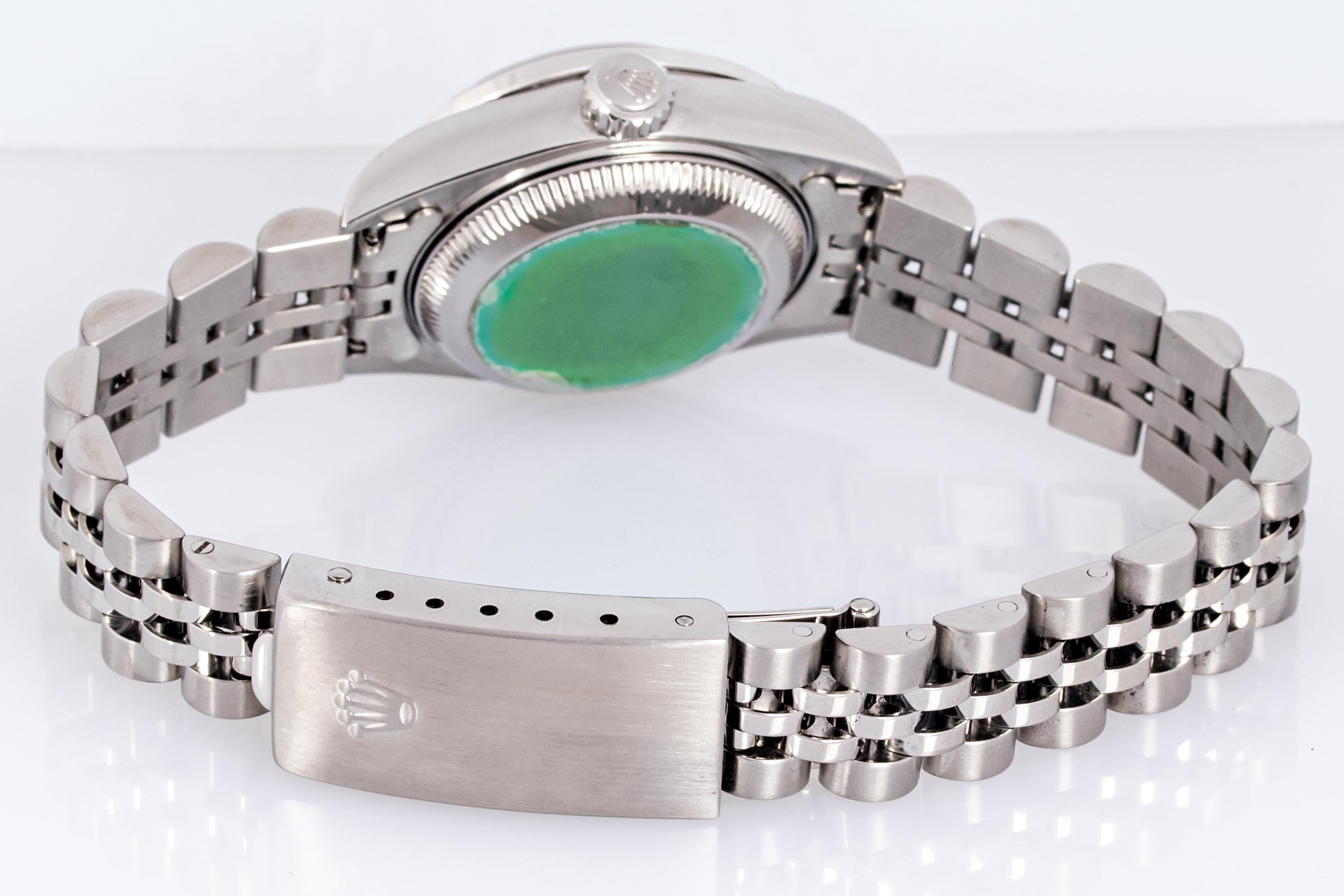 Rolex Montre Datejust pour femme avec cadran romain blanc et lunette en acier et or 18 carats avec diamants et rubis Bon état - En vente à Los Angeles, CA