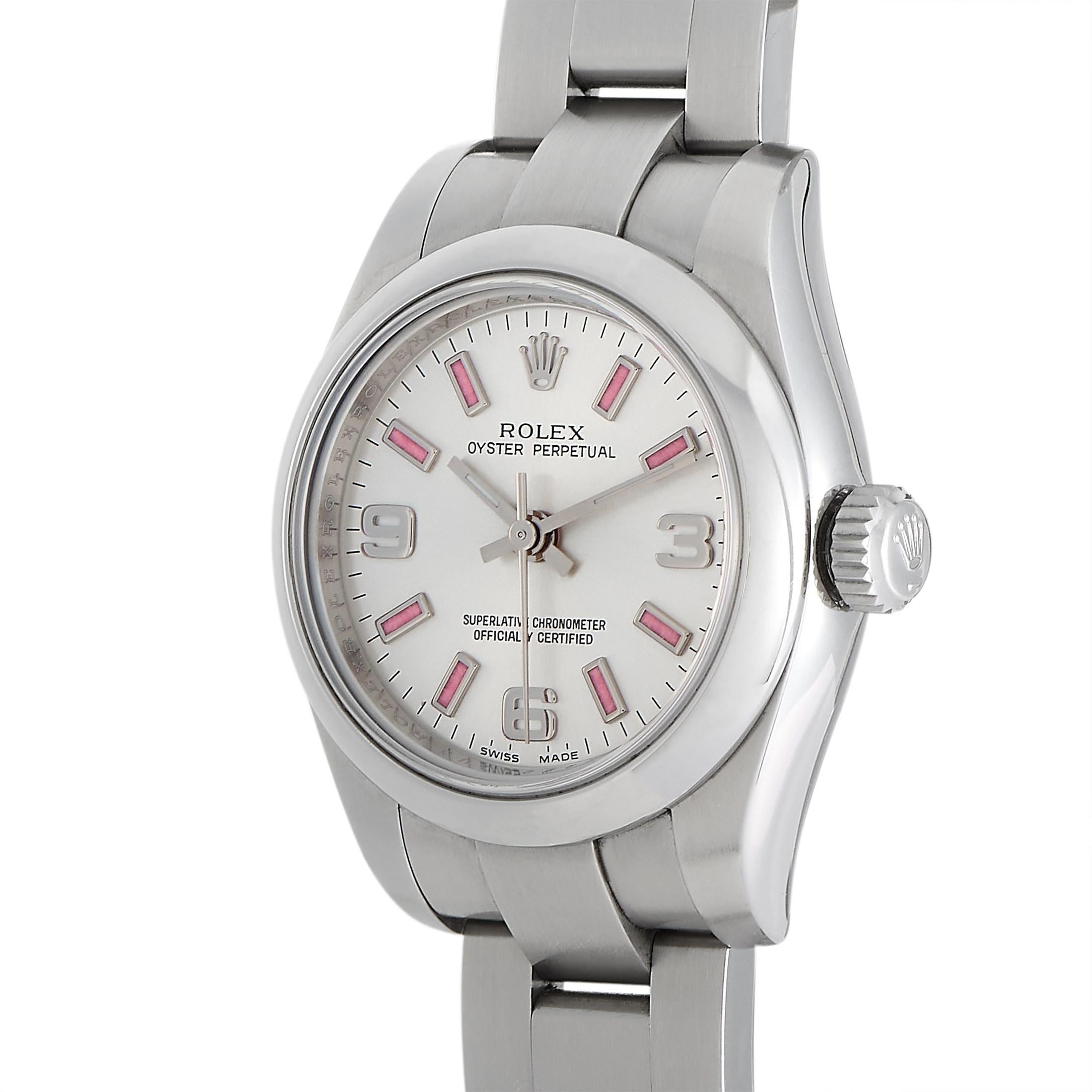 This Rolex Ladies Oyster Perpetual 26 mm Watch, reference number 176200, features a stainless case measuring 26 mm in diameter. It is presented on a matching white oystersteel bracelet and secured with a folding clasp. The silver dial displays