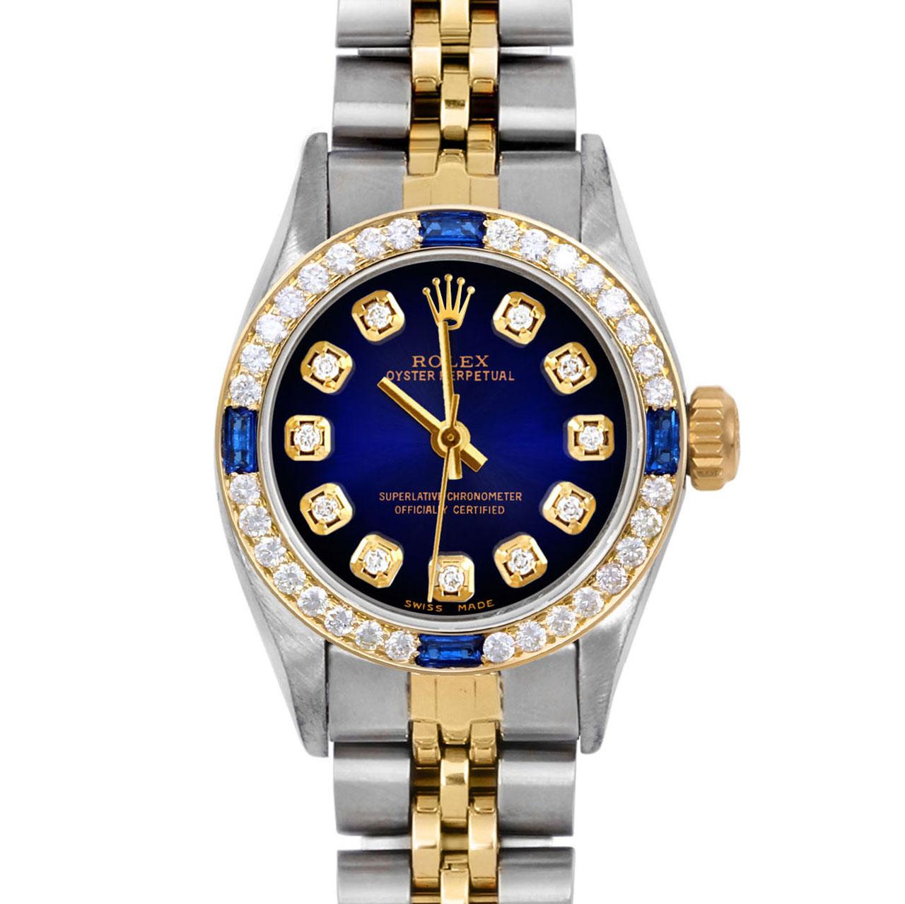 Brand : Rolex
Model : Oyster Perpetual 
Gender : Ladies
Metals : 14K Yellow Gold / Stainless Steel
Case Size : 24 mm
Dial : Custom Blue Vignette Diamond Dial (This dial is not original Rolex And has been added aftermarket yet is a beautiful Custom